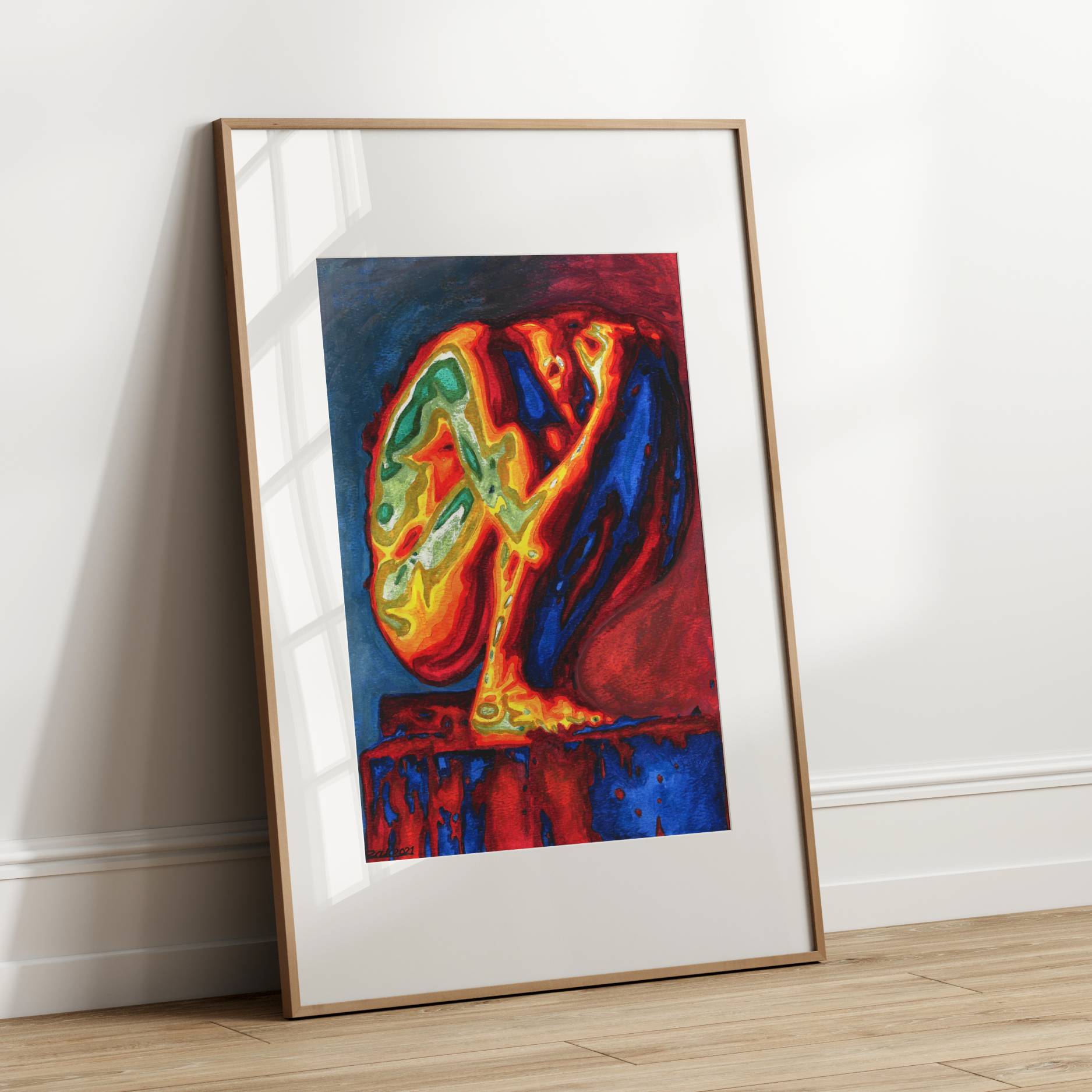 Framed abstract artwork on a white wall