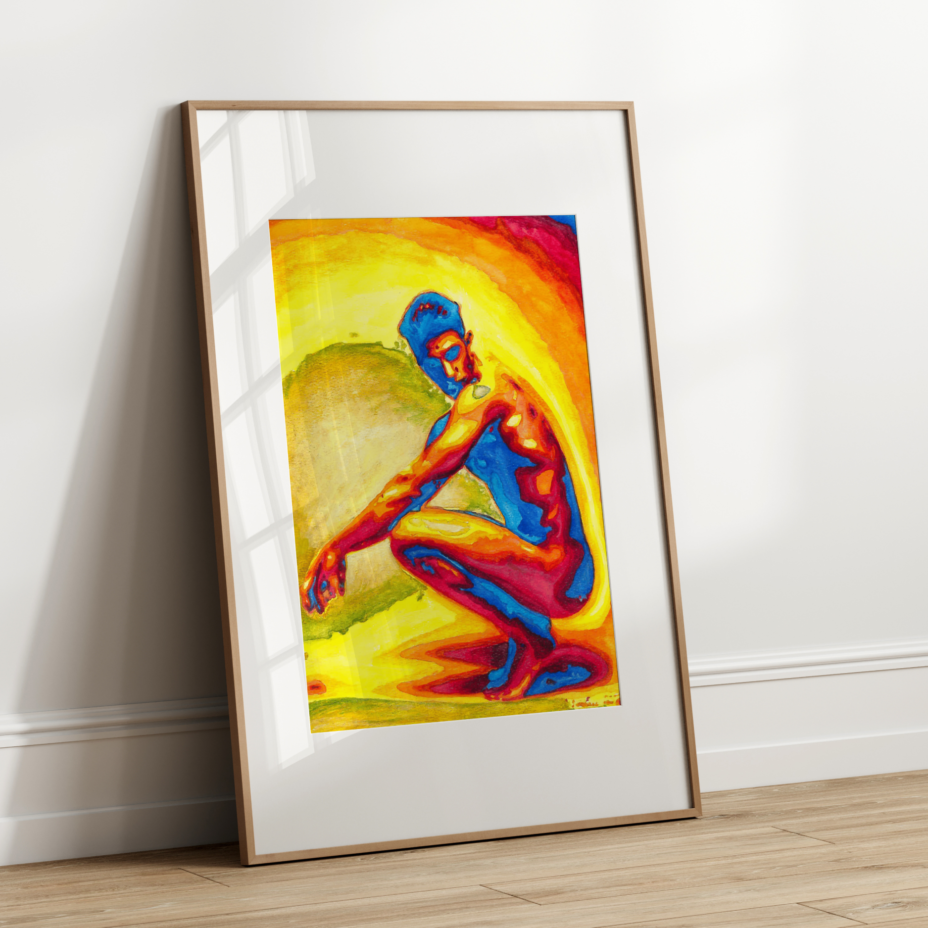 Framed colorful artwork of a figure on a white wall