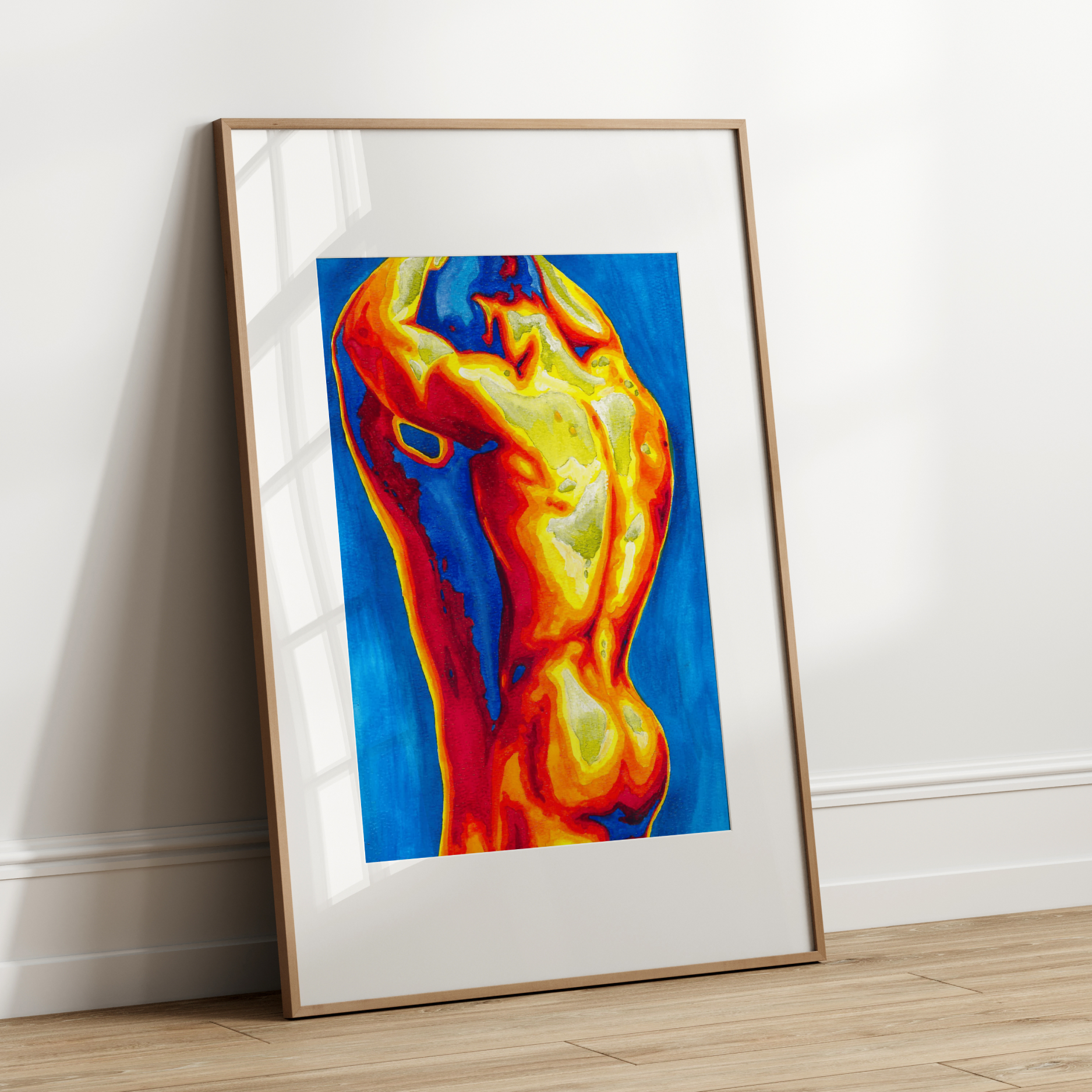 Framed abstract artwork of a nude figure on a white wall
