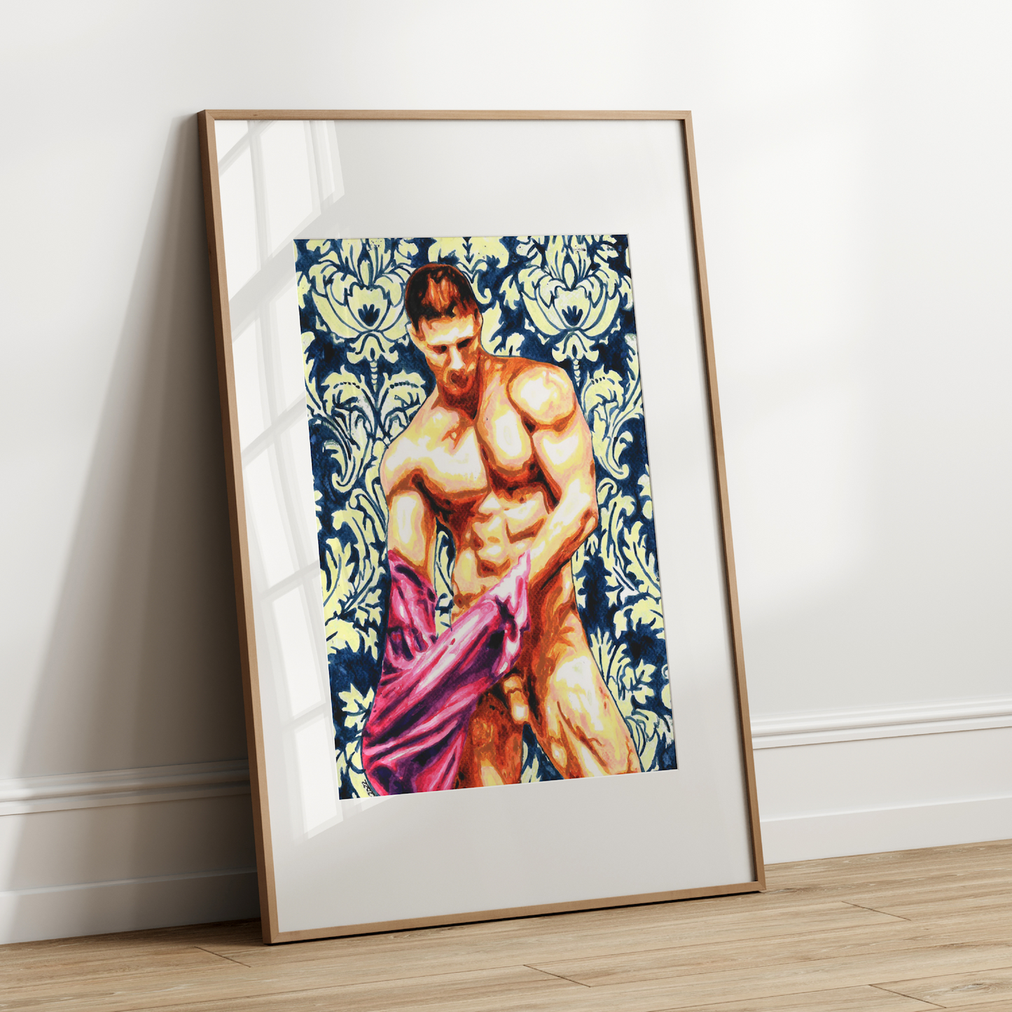 Framed artwork of a shirtless man holding a purple fabric against a decorative patterned background.