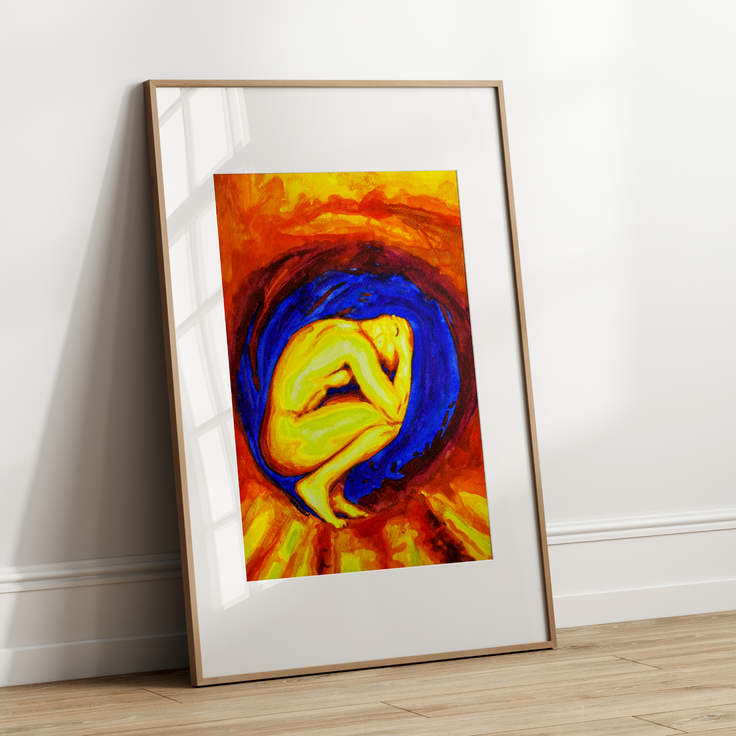 Framed abstract artwork on a white wall