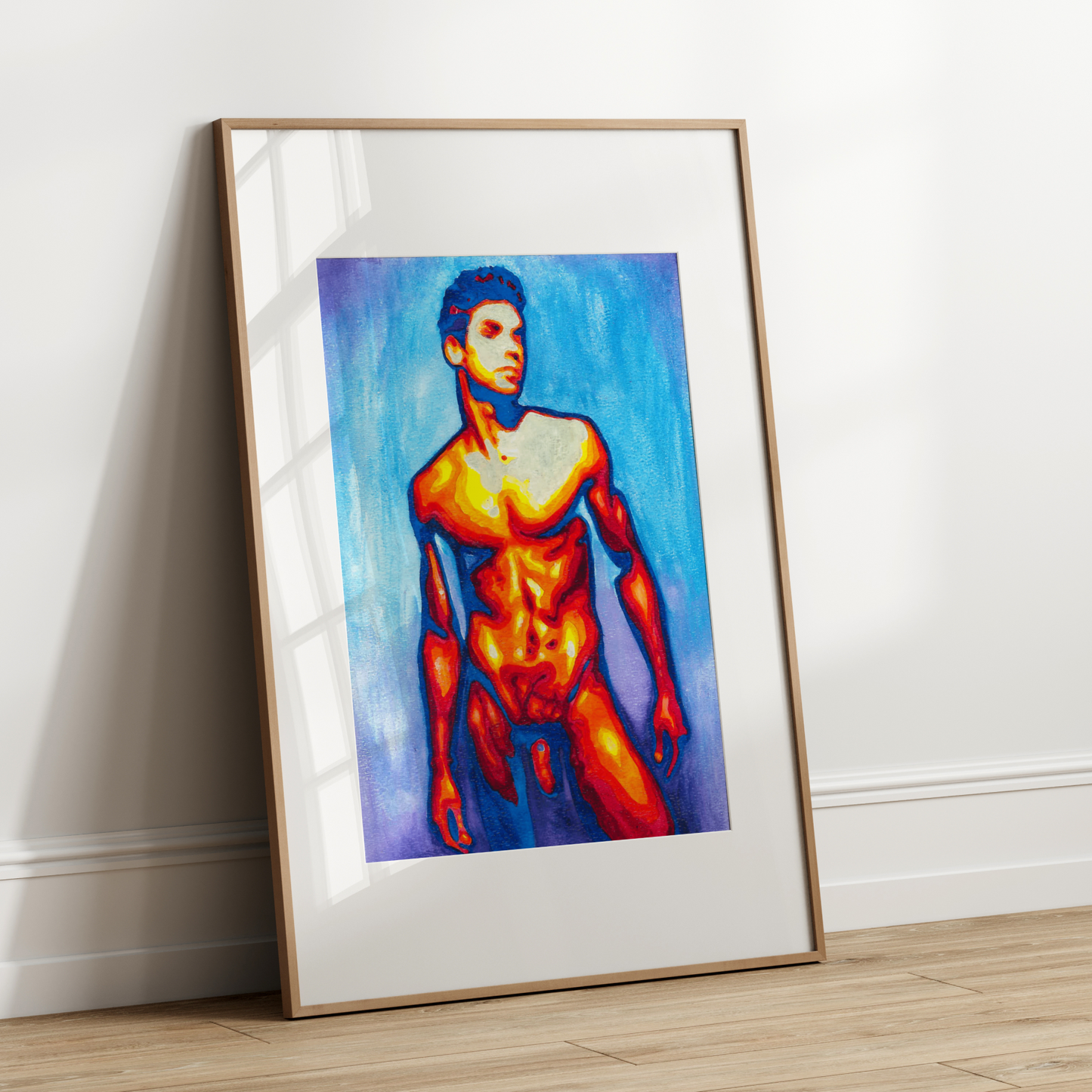 Framed artwork of a nude figure with vibrant colors leaning against a white wall.