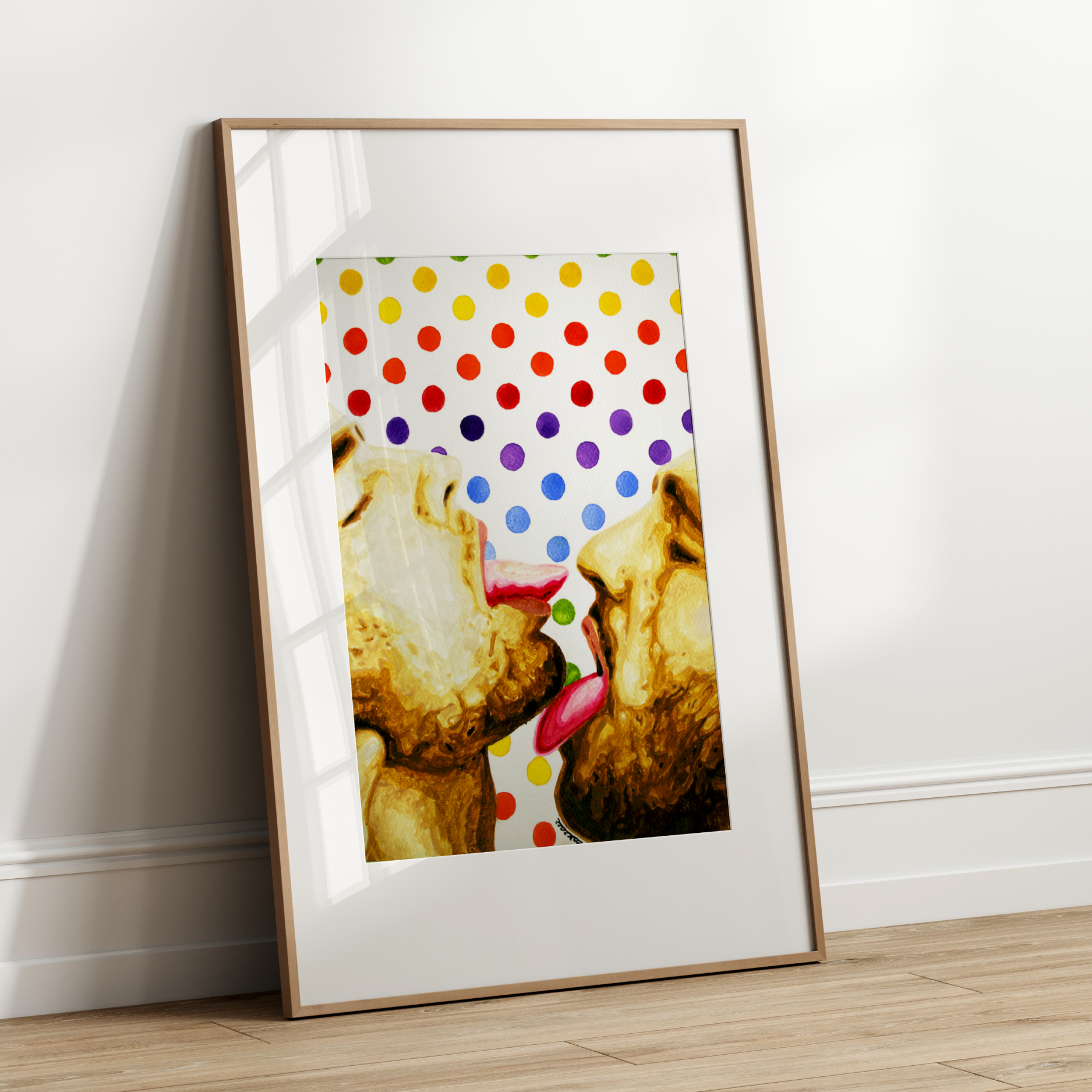 Framed artwork of two gay couple kissing with a colorful polka dot background.