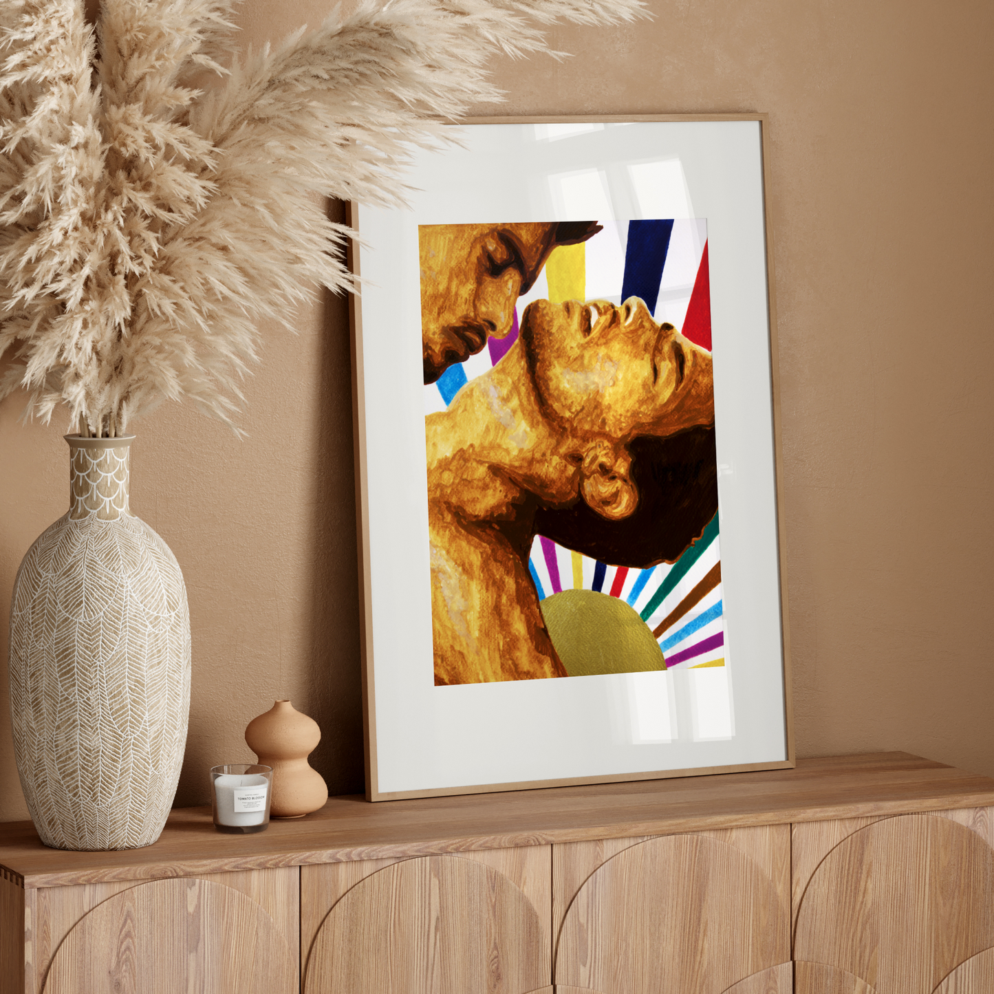 Framed artwork on a wooden sideboard with decorative elements.