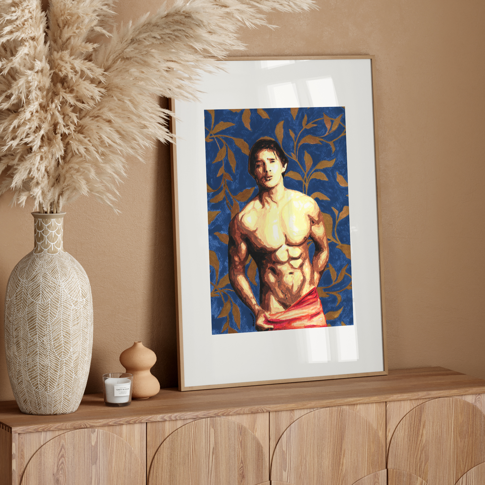 Framed artwork of a shirtless man on a wooden sideboard with decorative elements.