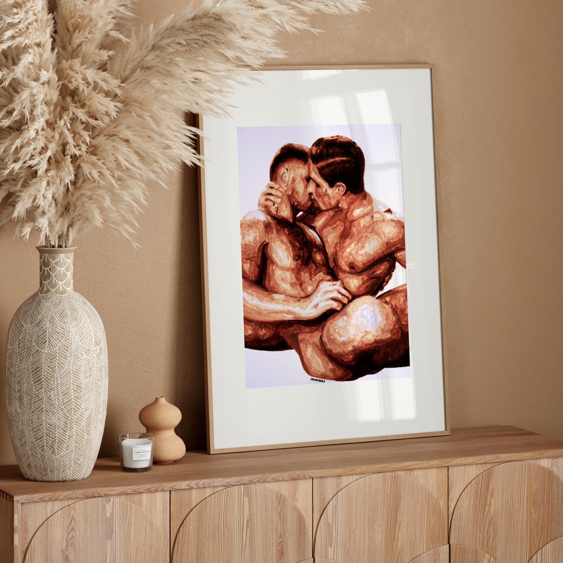 Framed artwork of two muscular figures on a wooden sideboard with decorative elements.