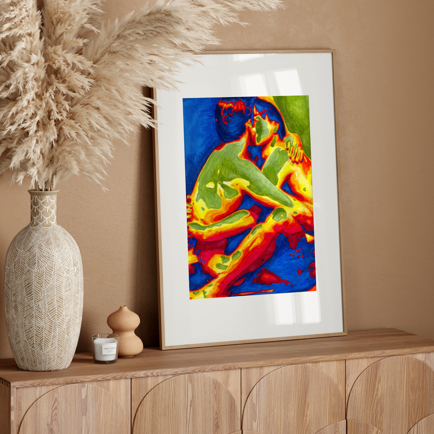 Colorful abstract art print on a wooden sideboard with decorative elements.