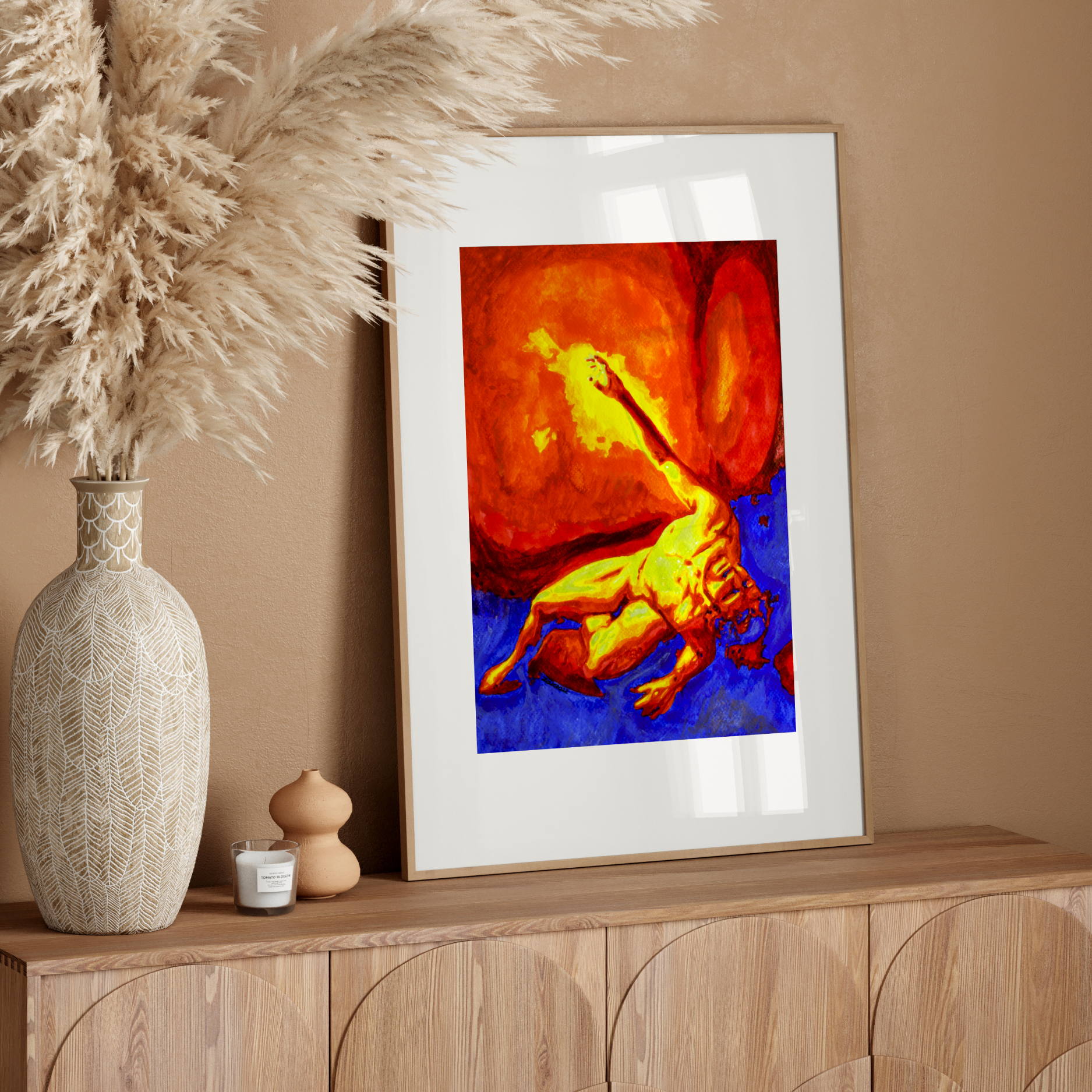 Framed abstract artwork on a wooden console table with decorative elements.