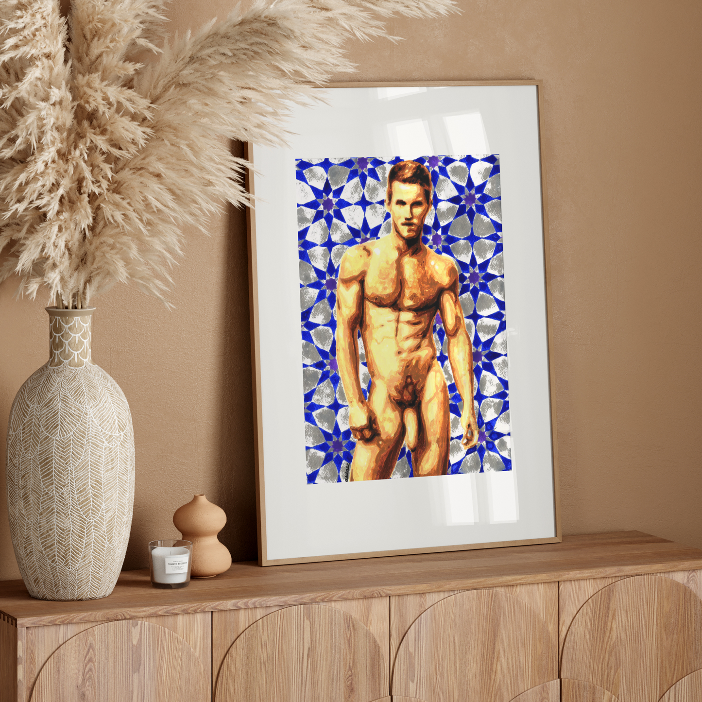Framed artwork of a nude figure on a wooden sideboard with decorative elements.