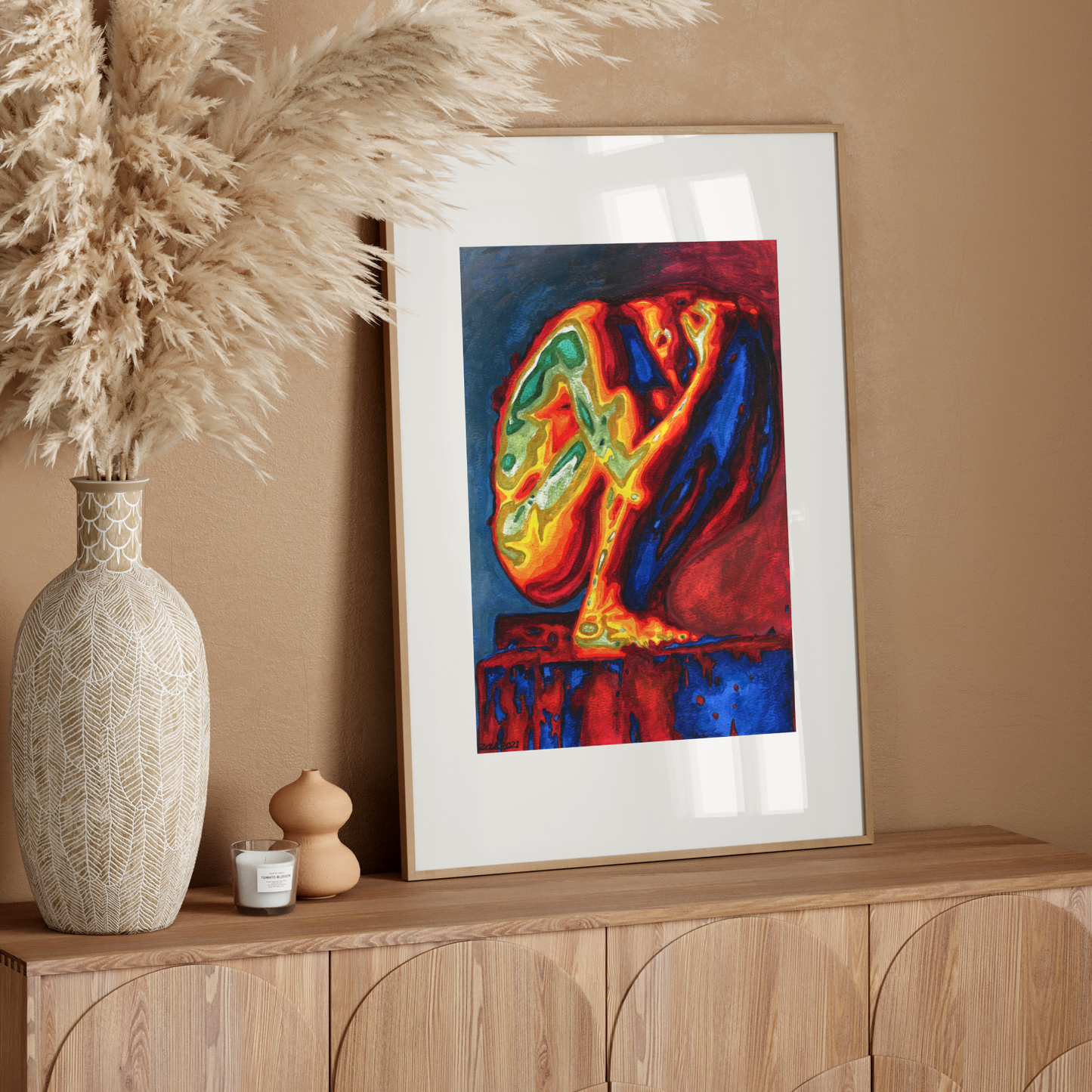 Colorful abstract painting on a wooden sideboard with decorative elements.