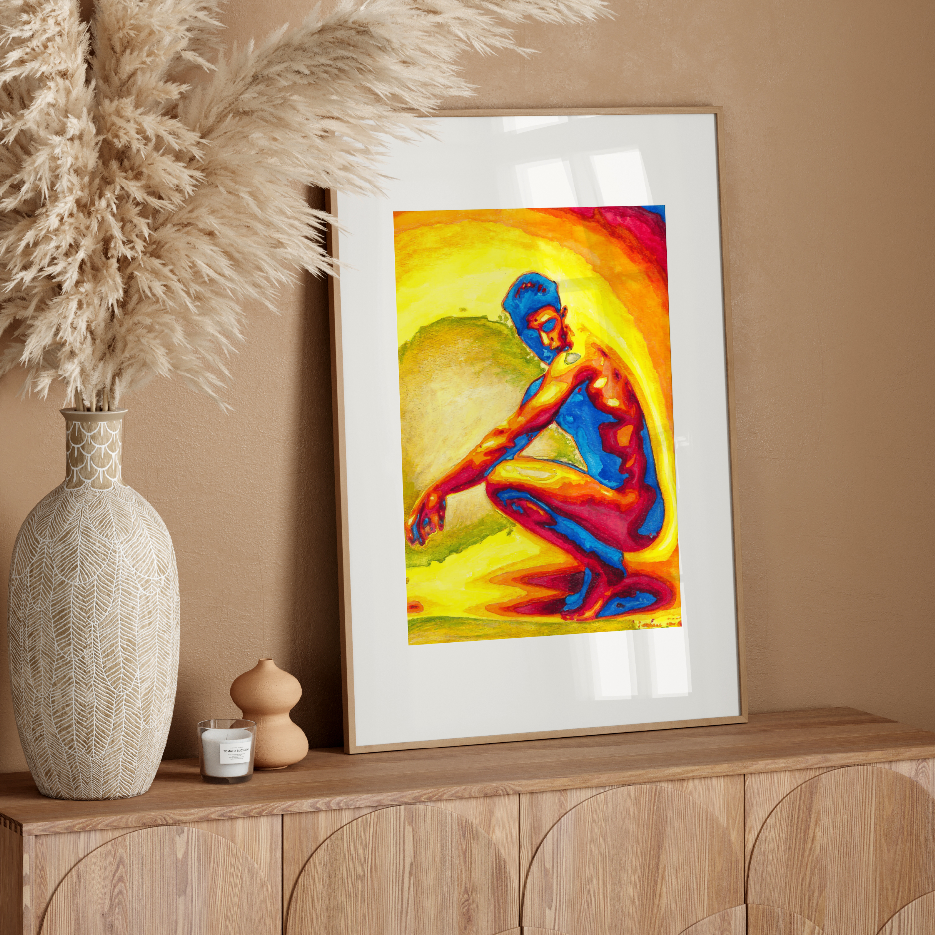 Framed colorful artwork of a figure on a wooden sideboard with decorative elements.