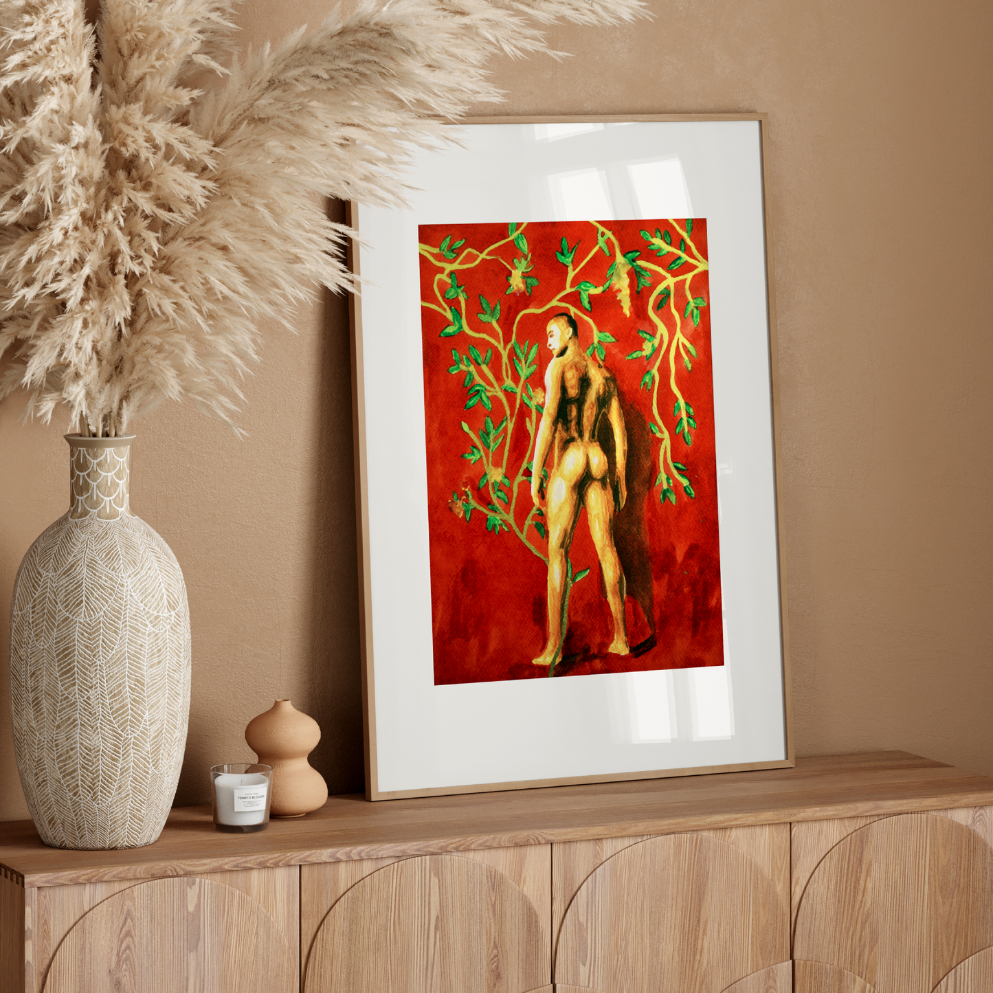 Framed artwork on a wooden console table with decorative elements.