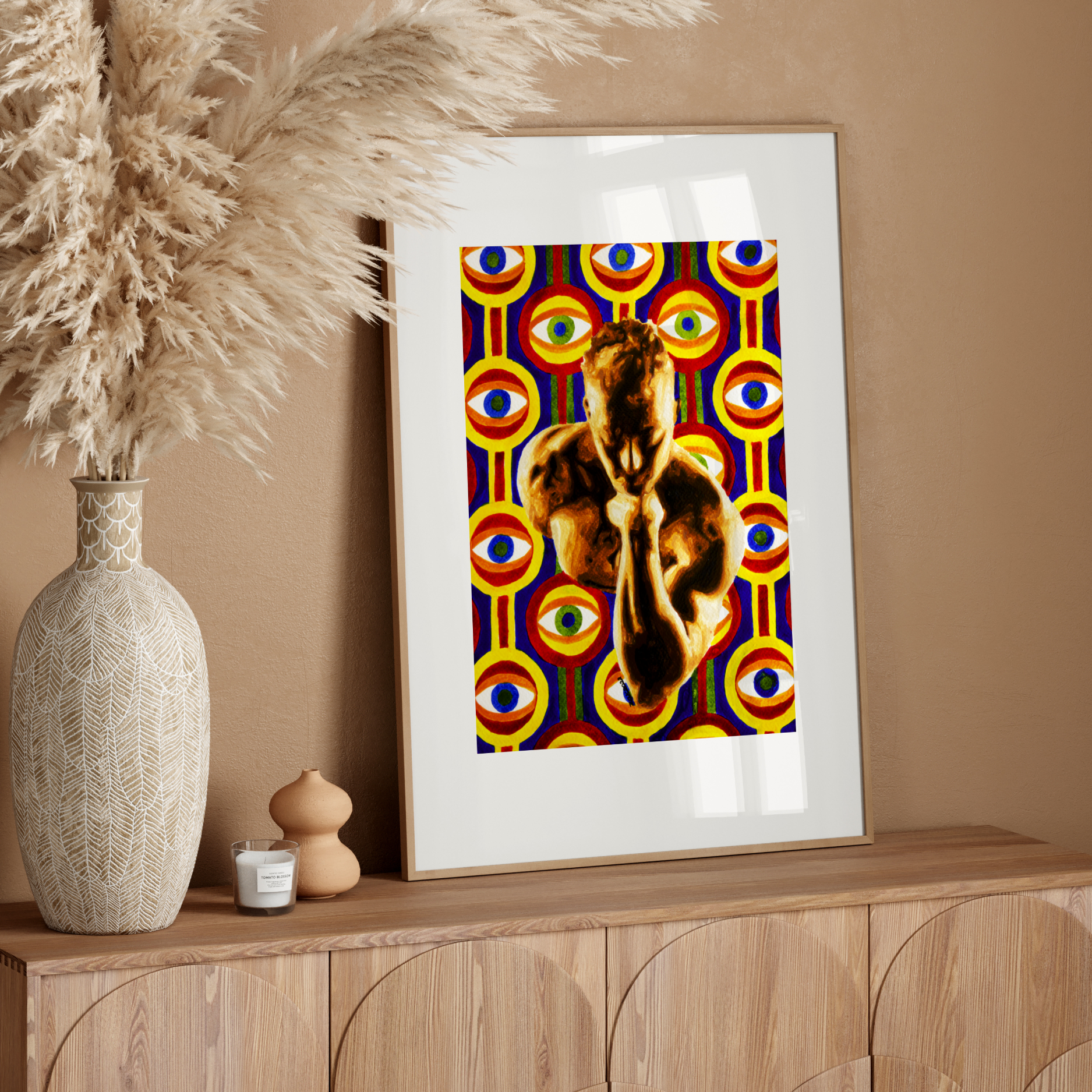 Framed abstract art on a wooden console table with decorative elements.