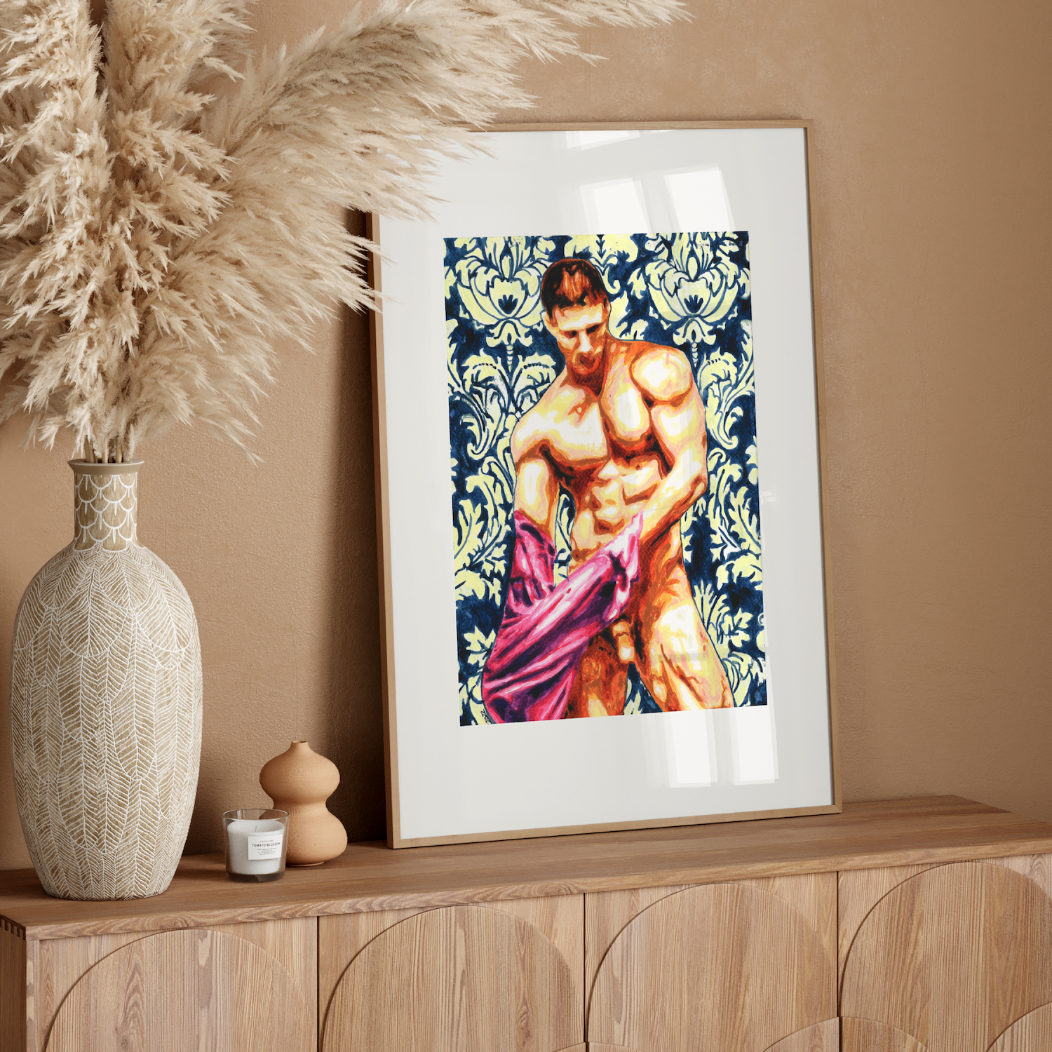 Framed artwork of a muscular figure on a wooden sideboard with decorative elements.