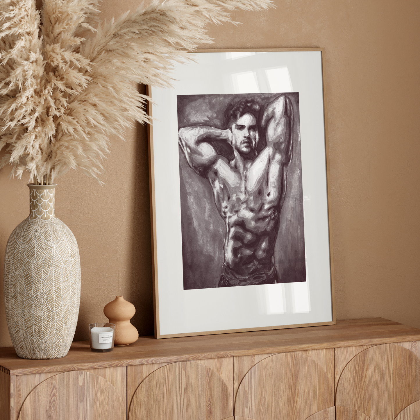Framed artwork of a muscular man on a wooden sideboard with decorative elements.