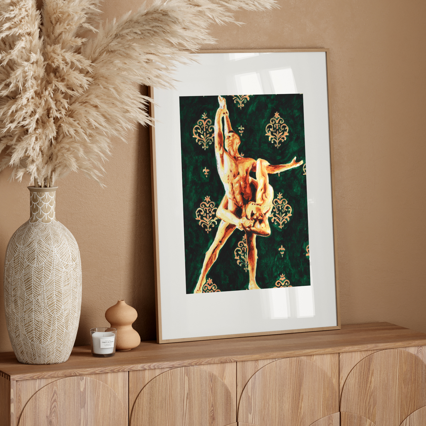 Framed artwork of a dancer on a wooden sideboard with decorative elements.