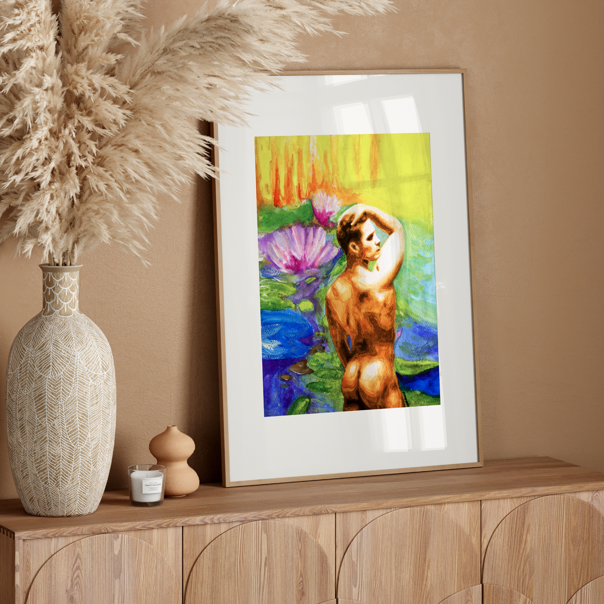 Framed artwork on a wooden console table with decorative elements.
