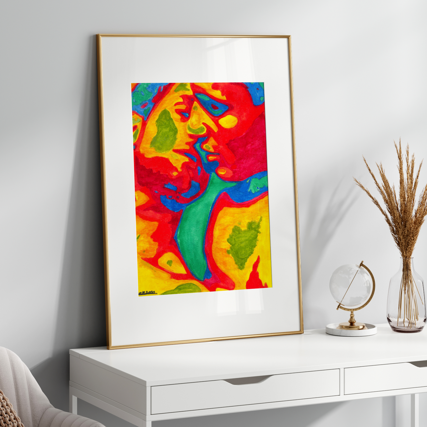 Framed colorful gay couple kissing art print on a white wall