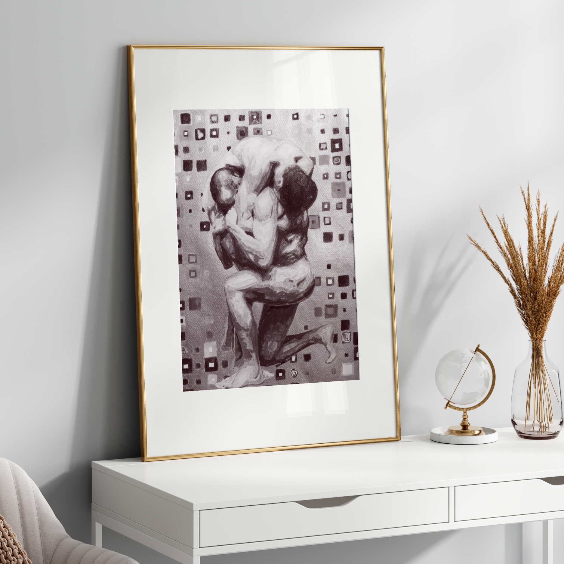 Framed artwork on a white wall above a white console table with decorative items.