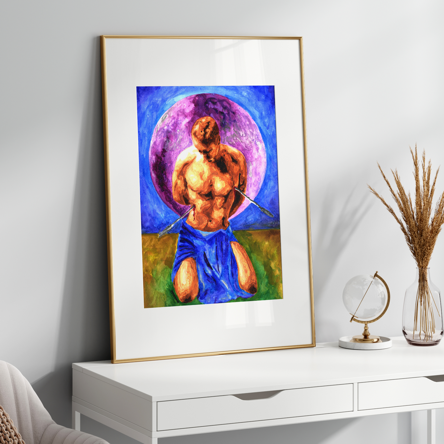 Framed artwork of a shirtless man with a purple circle on a white wall above a white console table.