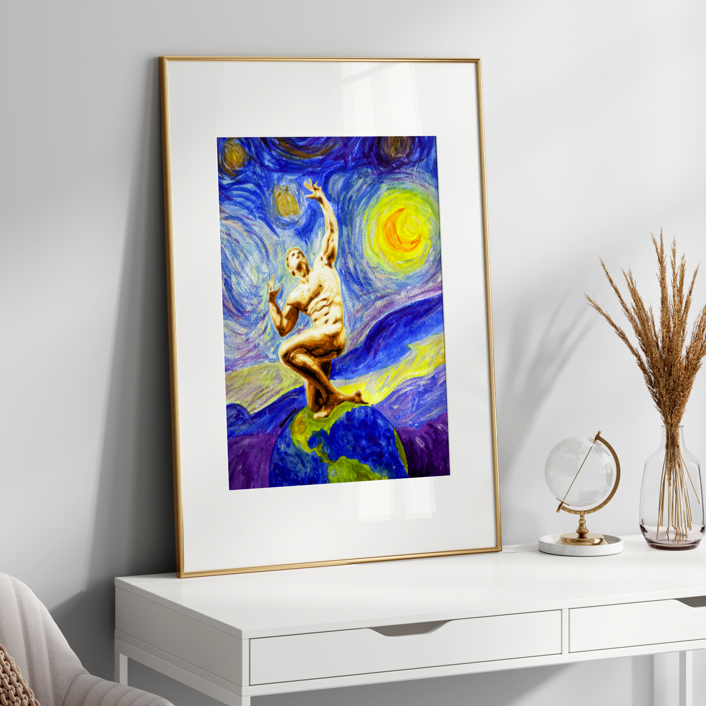 Framed artwork of a person on Earth with a colorful abstract background on a white wall.