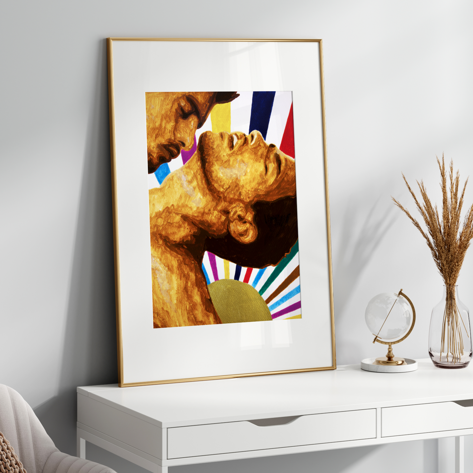 Framed artwork on a white wall above a white console table with decorative items.