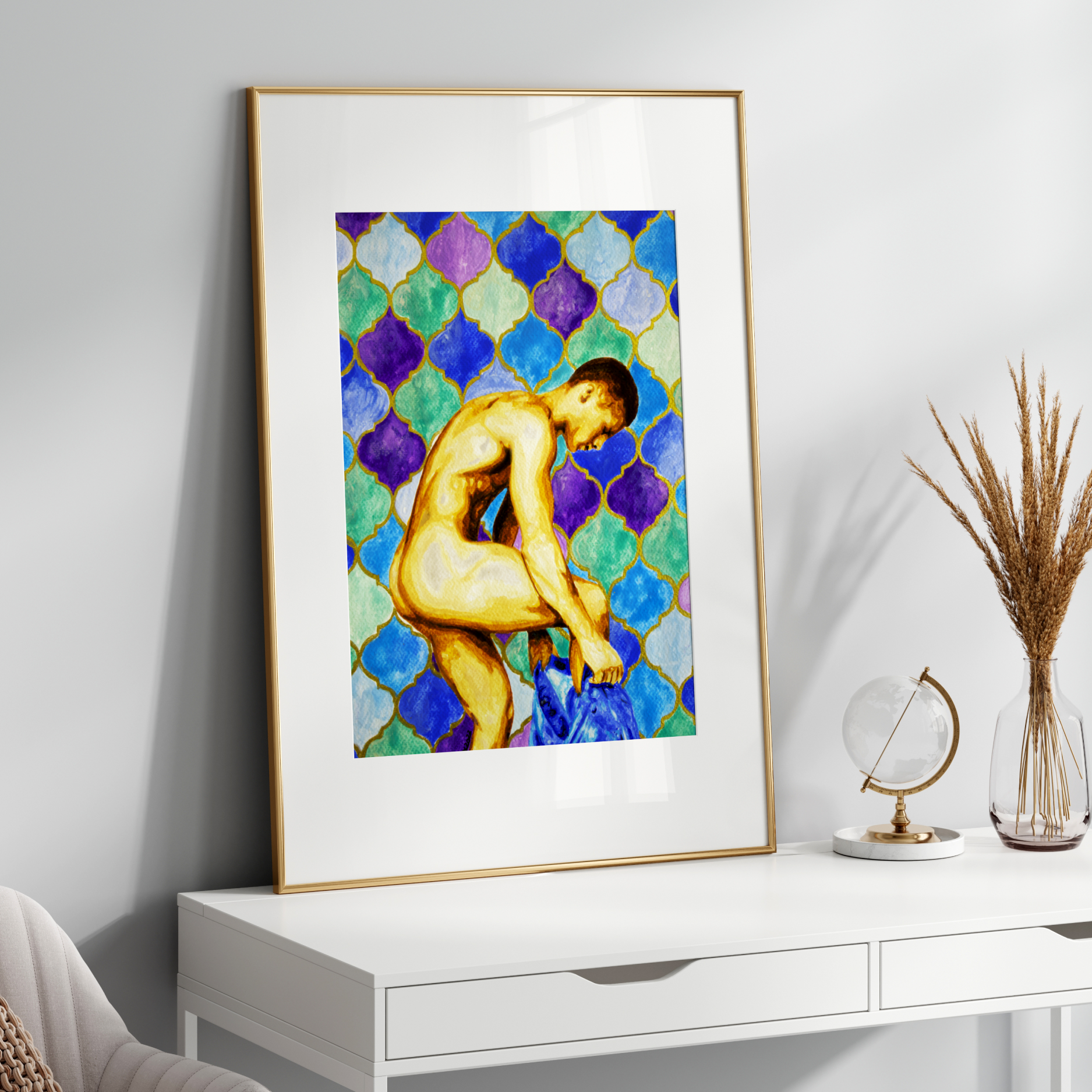 Framed artwork of a nude figure on a white wall above a white console table.