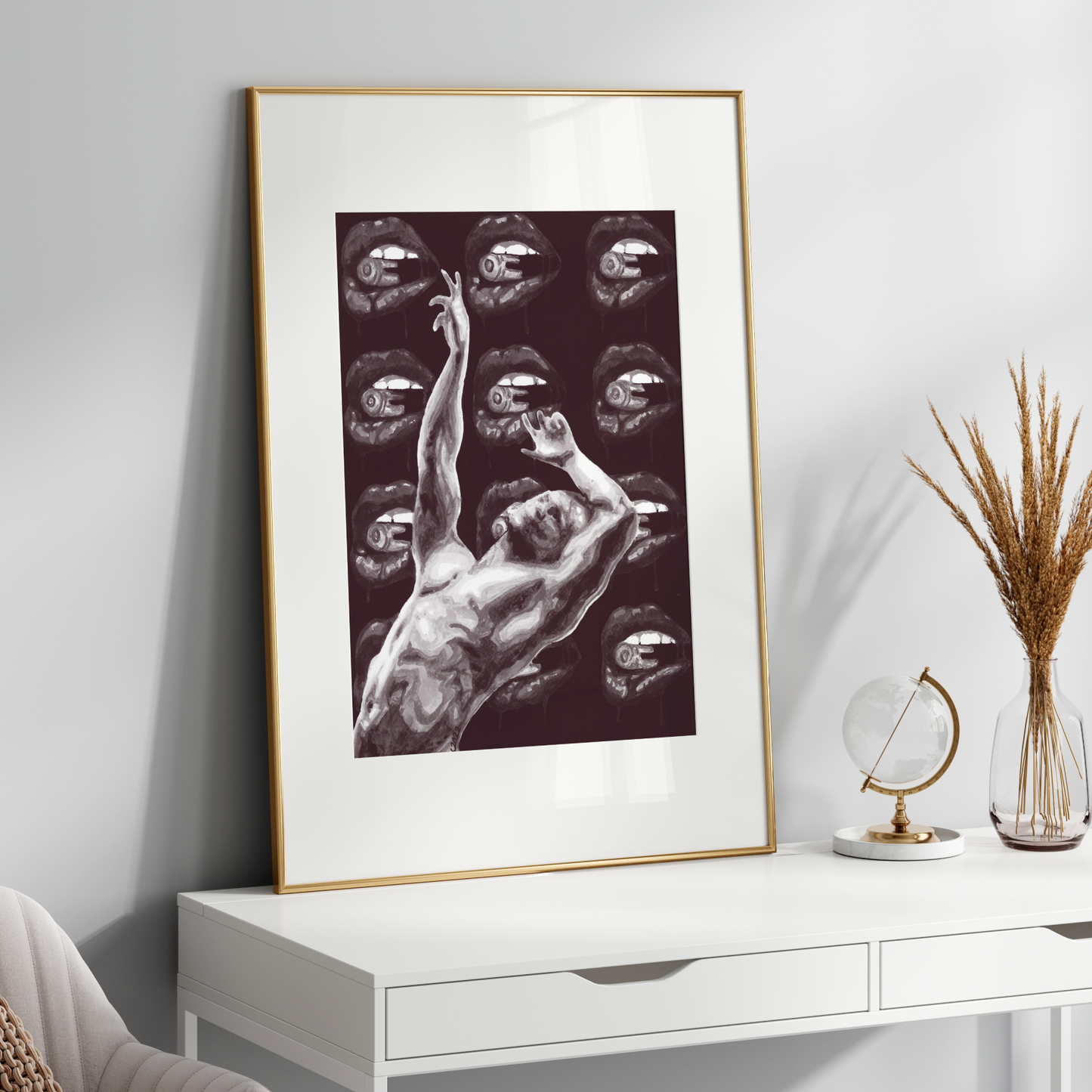 Framed artwork of a nude figure on a white wall above a white console table.