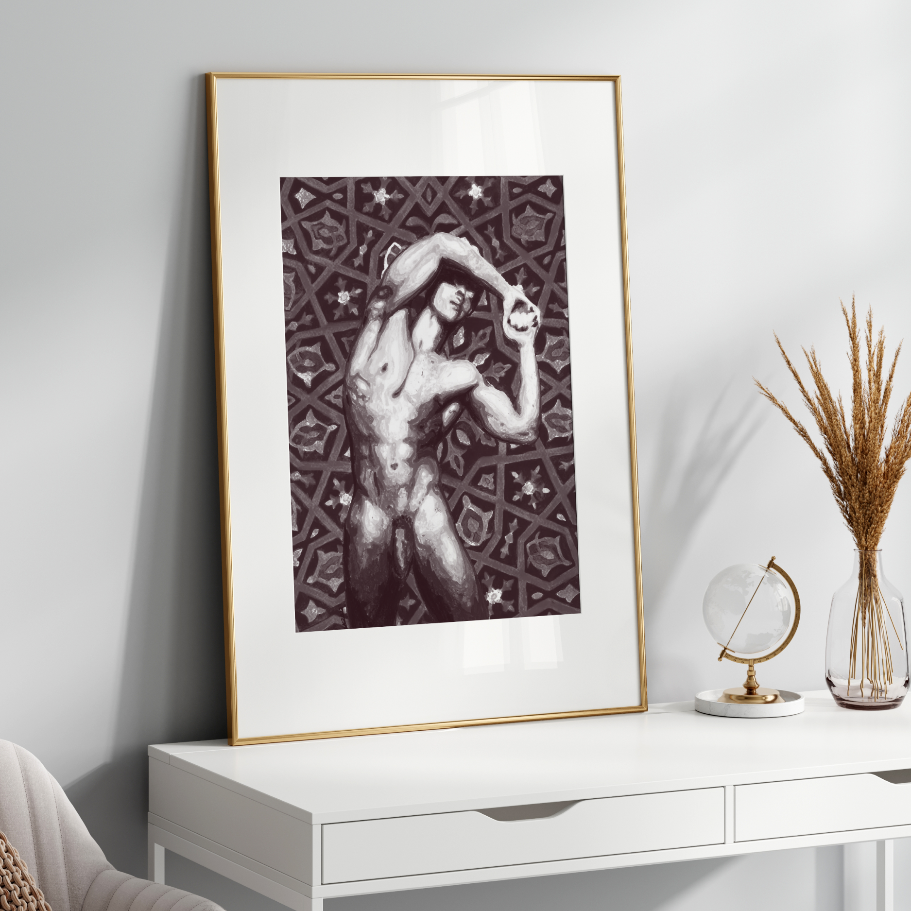 Framed artwork on a wooden console table with decorative elements against a  wall.