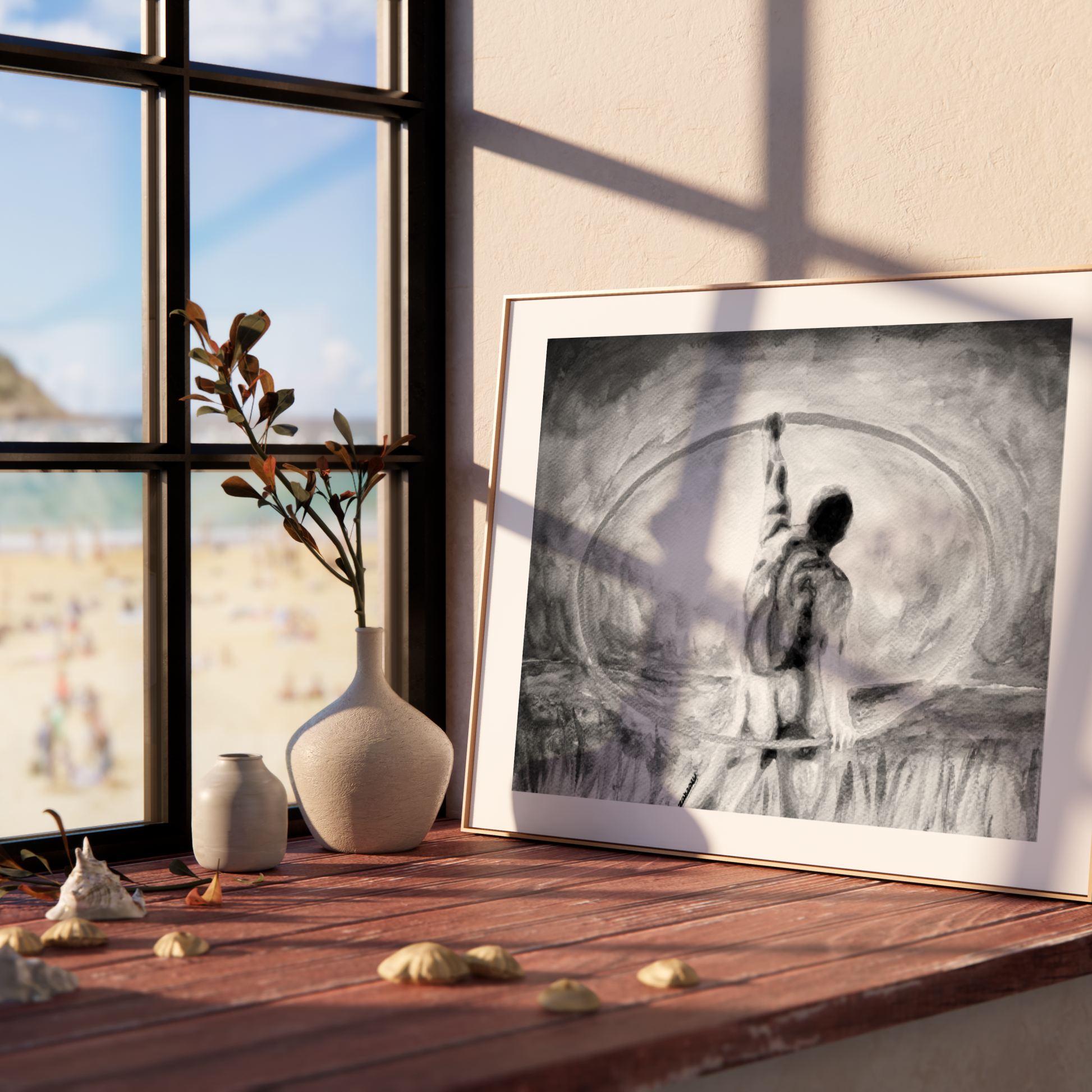 Framed black and white artwork on a wooden shelf with a window view