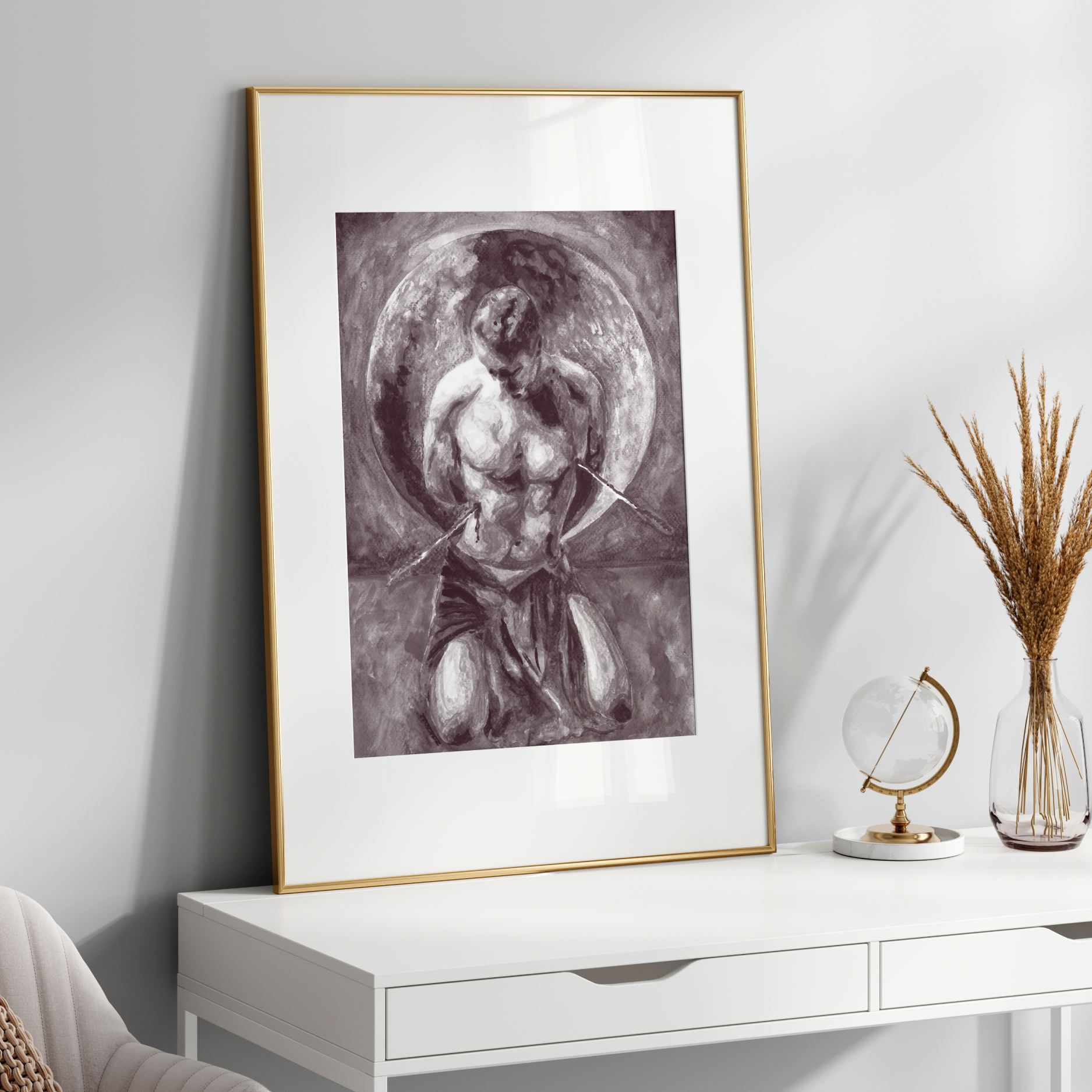 Framed artwork on a white wall above a white console table with decorative items.