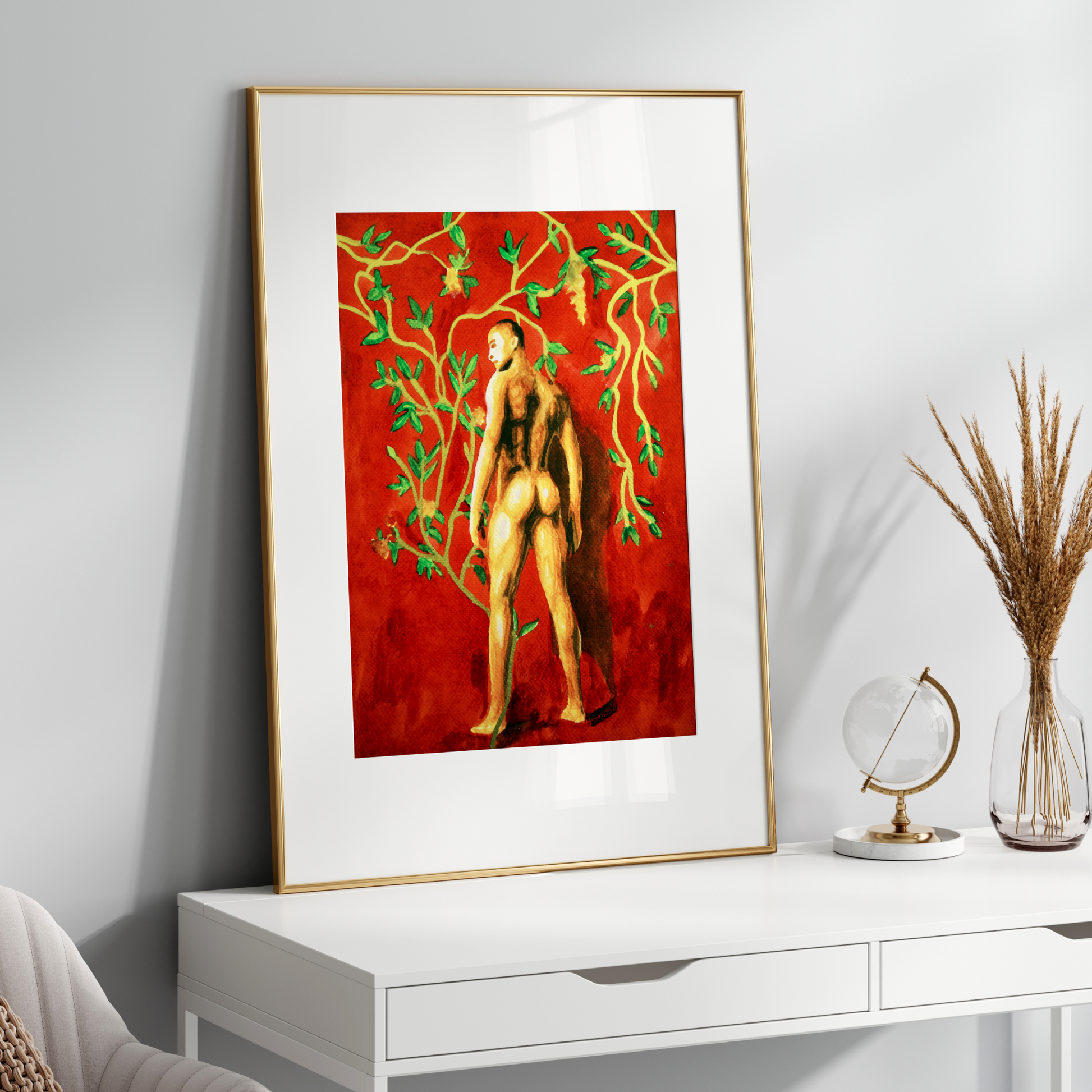 Framed artwork of a nude figure on a red background, displayed on a white console table.