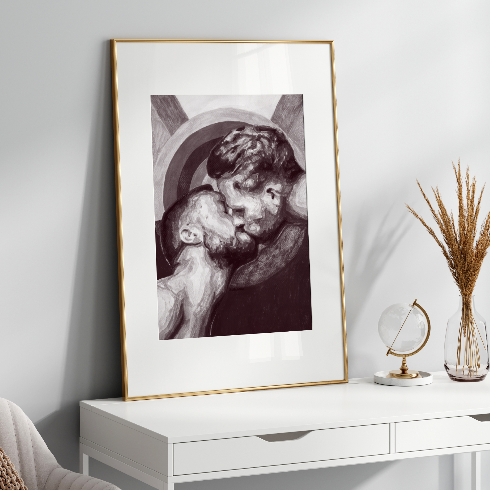 Framed artwork on a white wall above a white console table with decorative items.