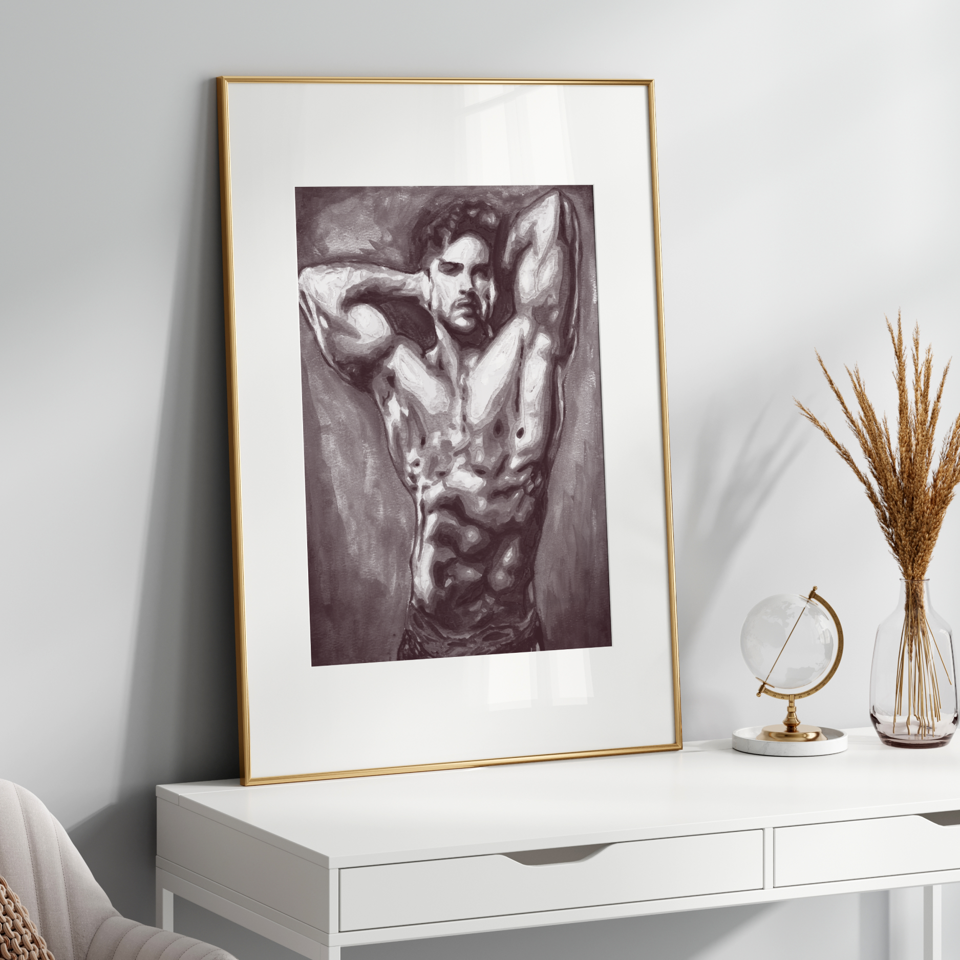 Framed black and white artwork on a white wall above a white console table.