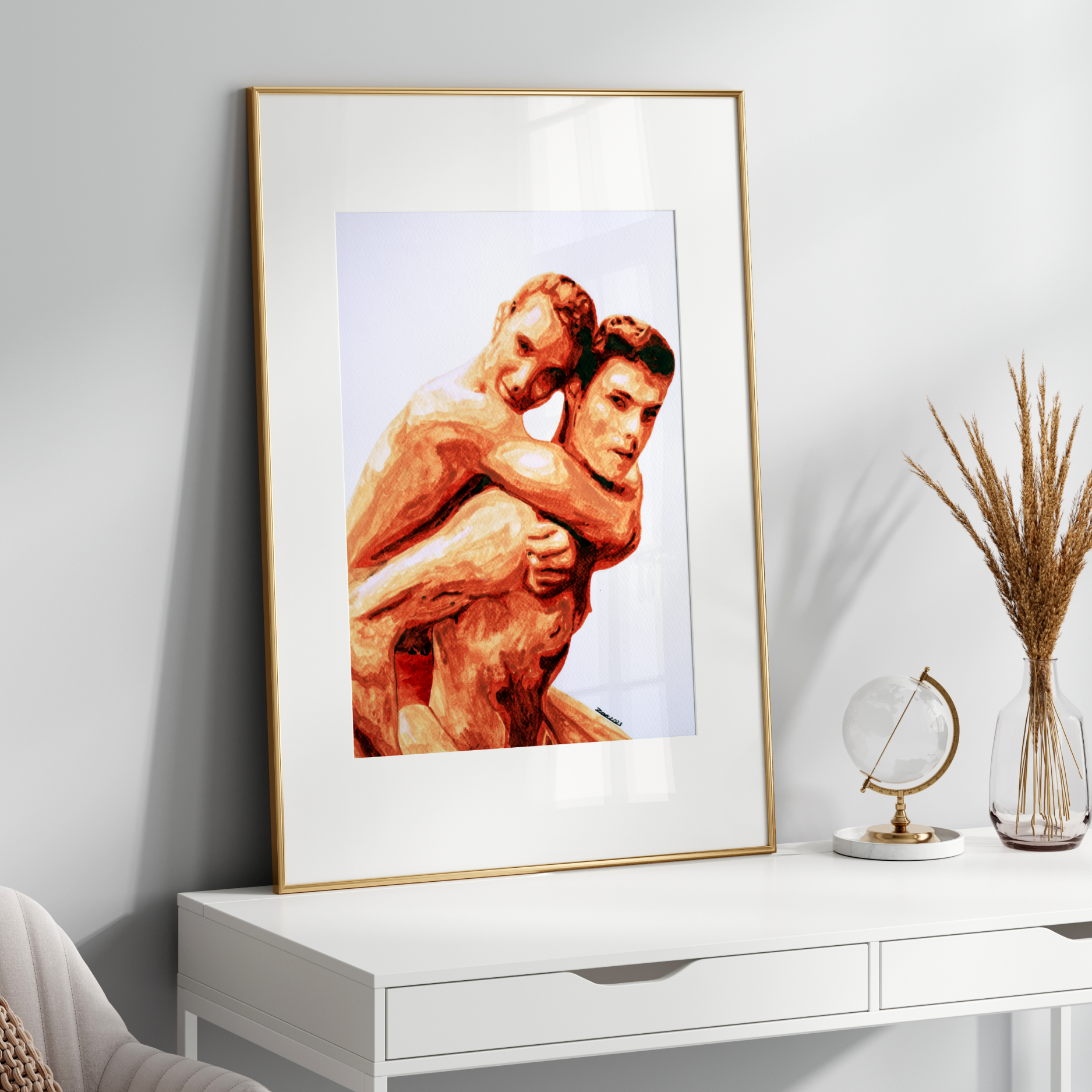 Framed artwork of two muscular figures on a white wall above a white console table.