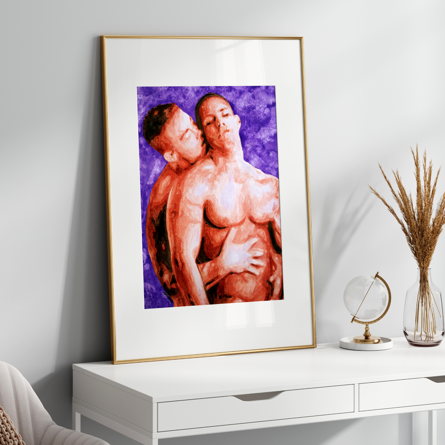 Framed artwork of two people embracing on a white shelf with decorative items.