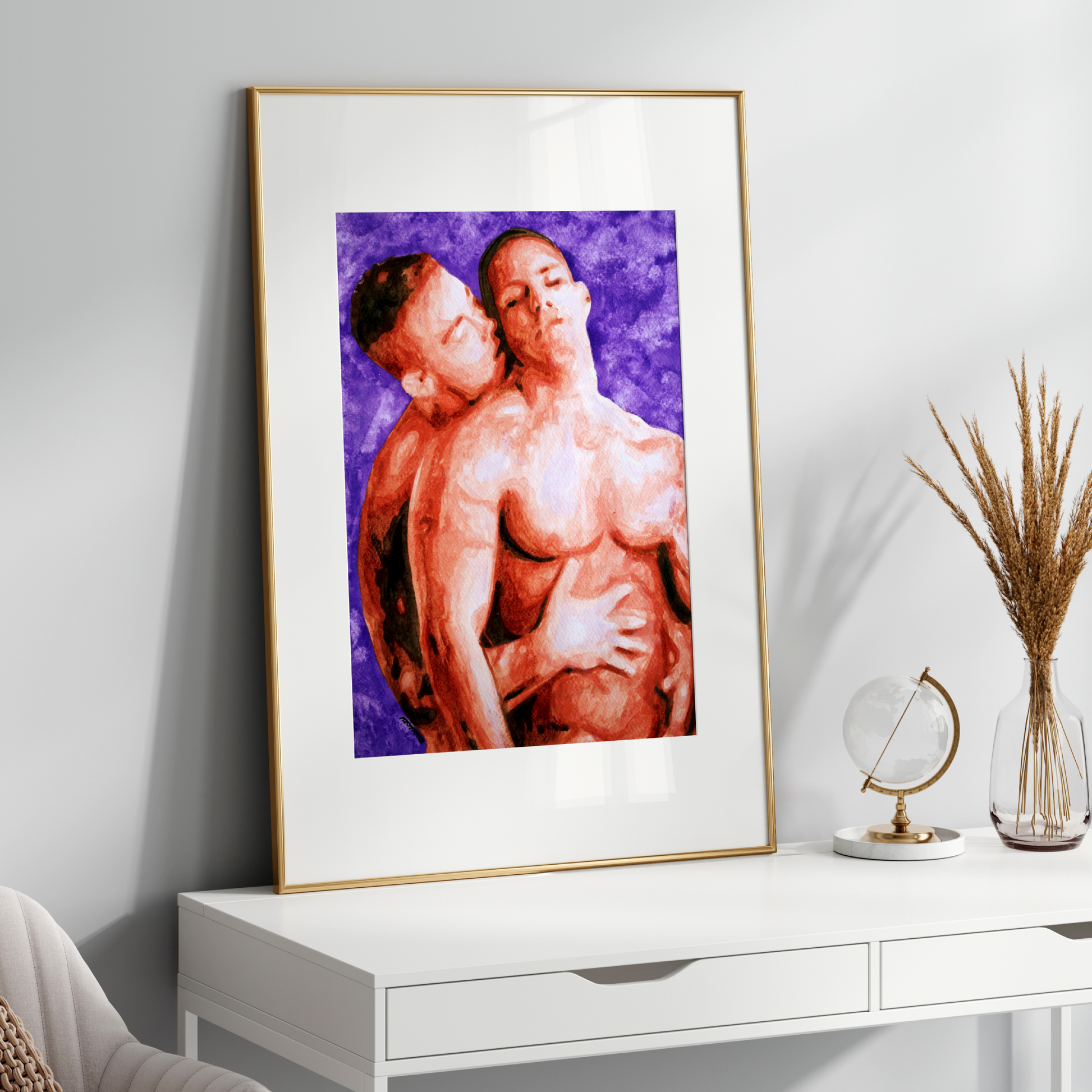 Framed artwork of two people embracing on a white shelf with decorative items.
