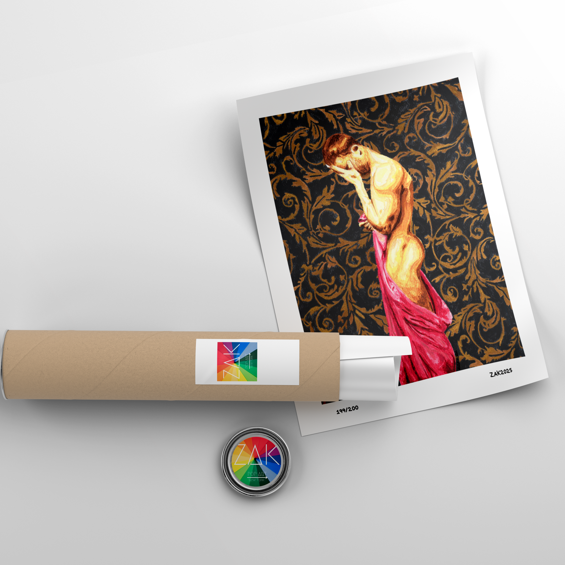 Artistic print of a nude figure on a decorative background with a roll of paper and a button in the foreground.