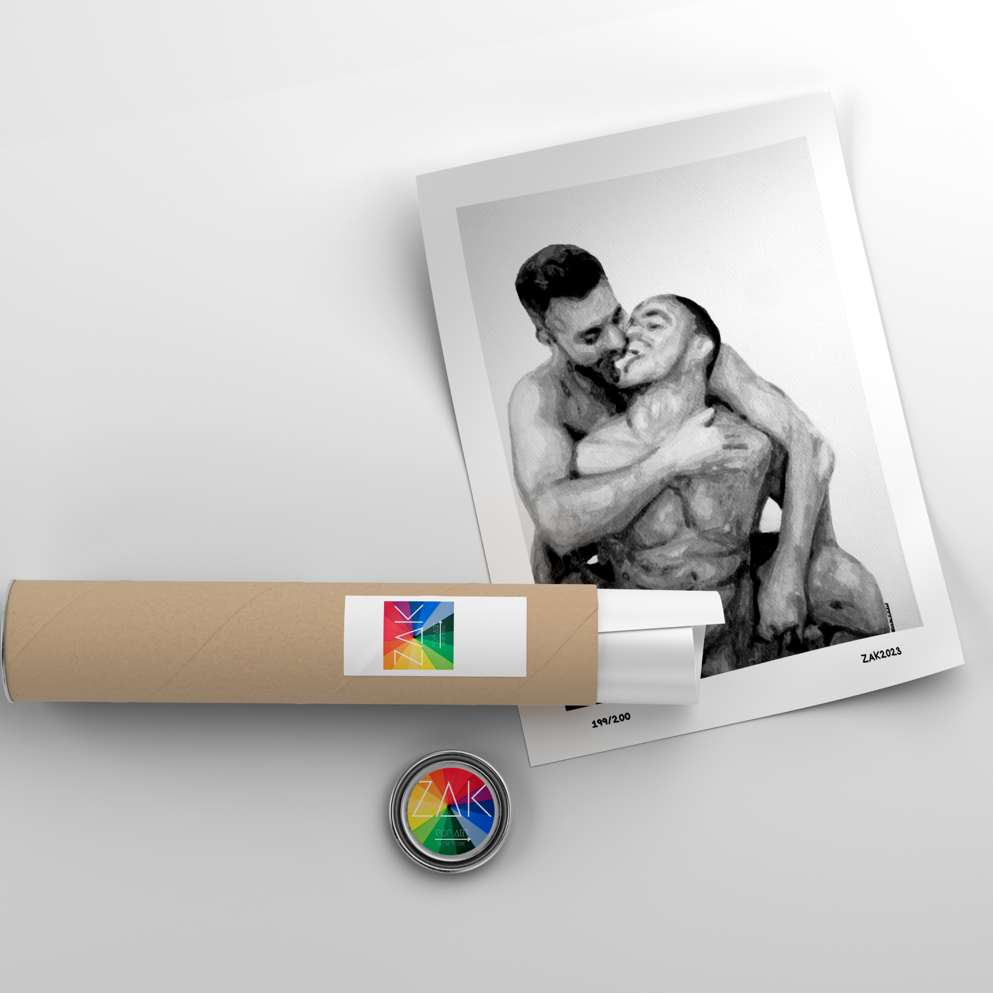 Roll of paper with a photo of two people embracing and a small round object on a light gray background