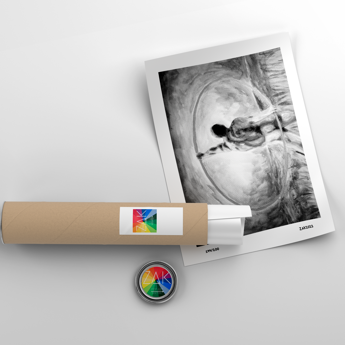 Roll of paper with a photo and a small round object on a light gray background