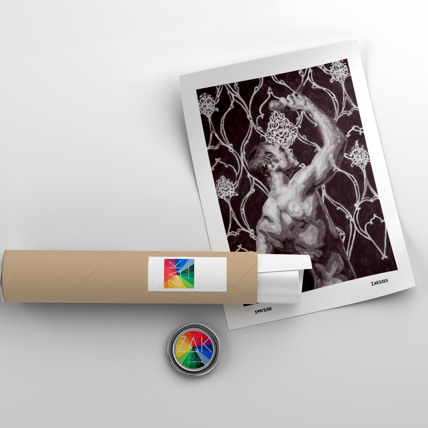 Artistic print of a nude figure with floral patterns on a white background, accompanied by a cylindrical packaging tube.