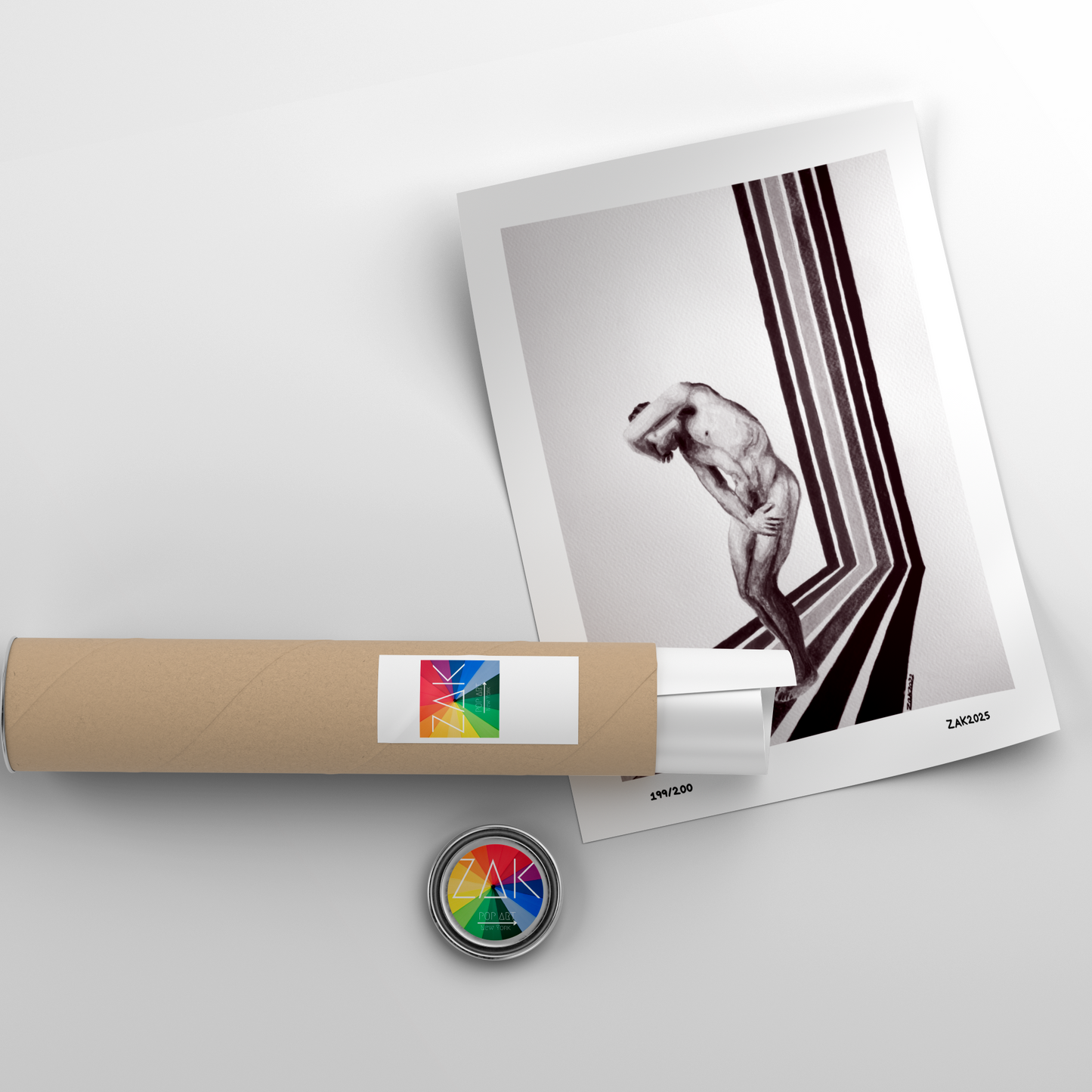Roll of paper with a colorful label and a photograph on a light gray background