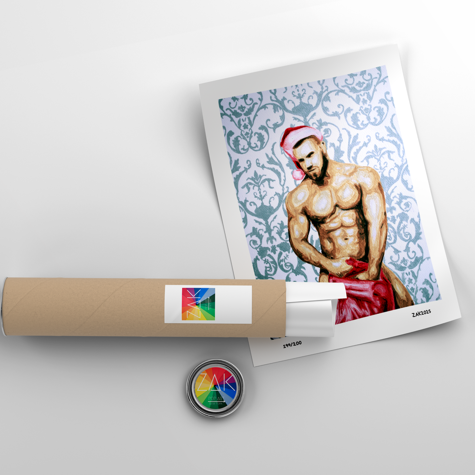 Art print of a muscular figure with a red bandana on a white background, next to a rolled-up poster and a small round object.