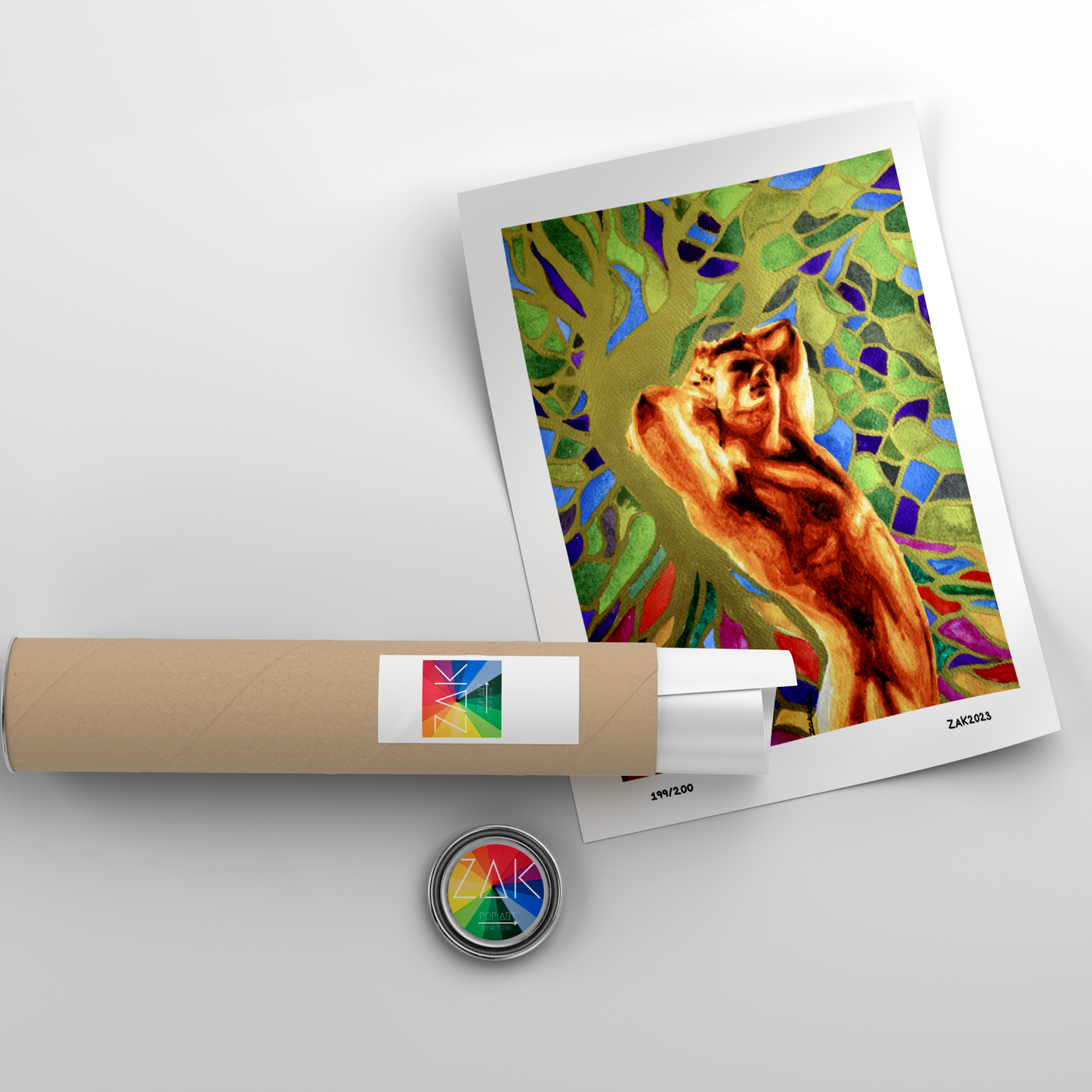 Colorful abstract art print of a cat on a white background with a roll of paper and a button.