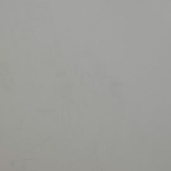 Framed artwork of two profiles on a white wall video