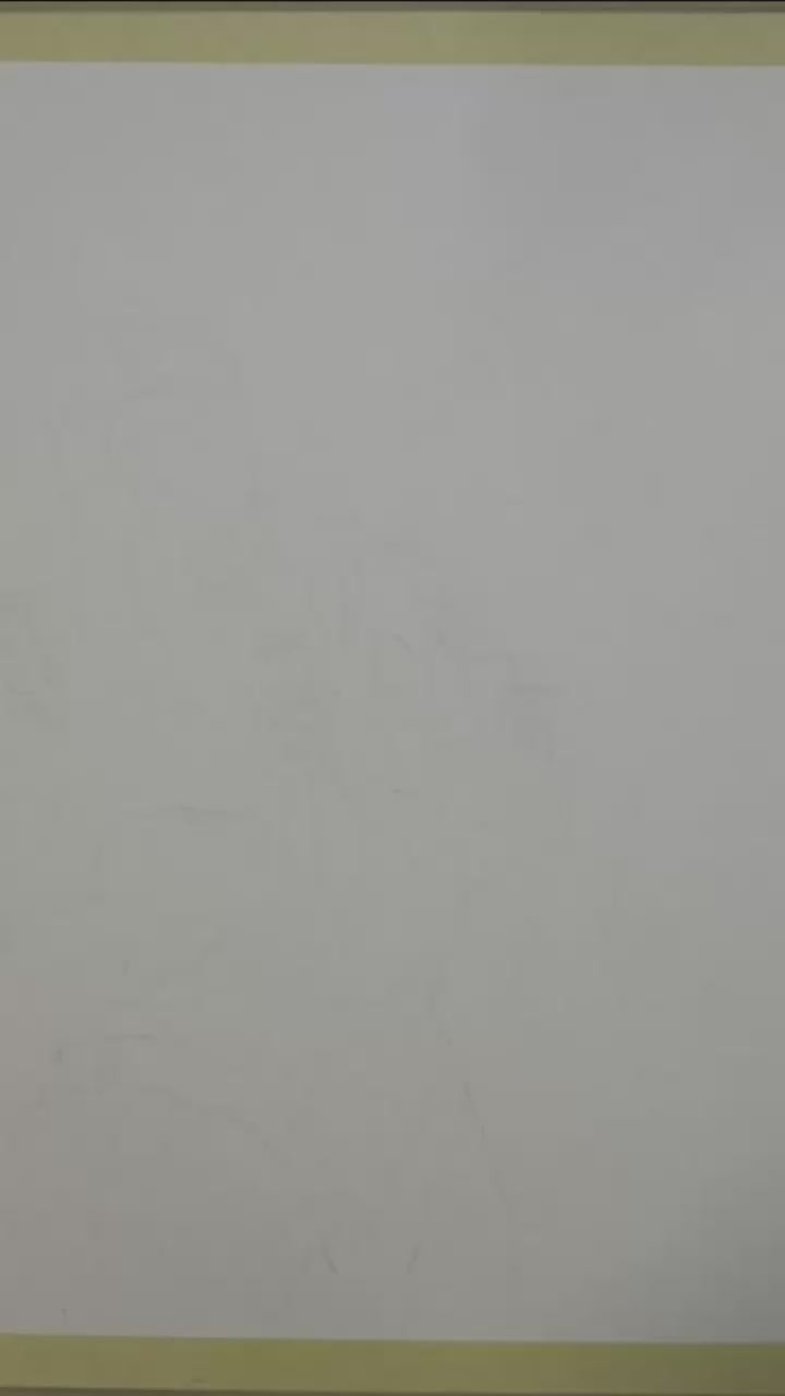 Framed artwork of two profiles on a white wall video