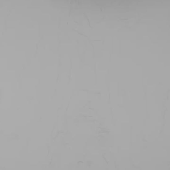 Black and white gay erotic illustration of a playful man licking his lips while looking up at a male figure, with suggestive body language.