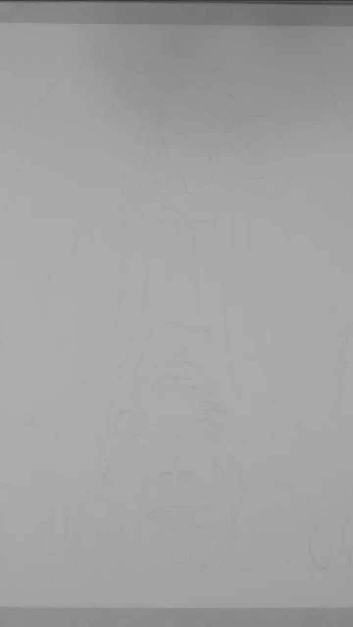 Black and white gay erotic illustration of a playful man licking his lips while looking up at a male figure, with suggestive body language.