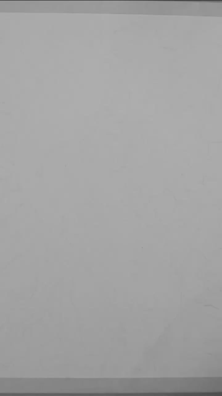 Framed artwork of a nude figure with abstract patterns on a white wall video