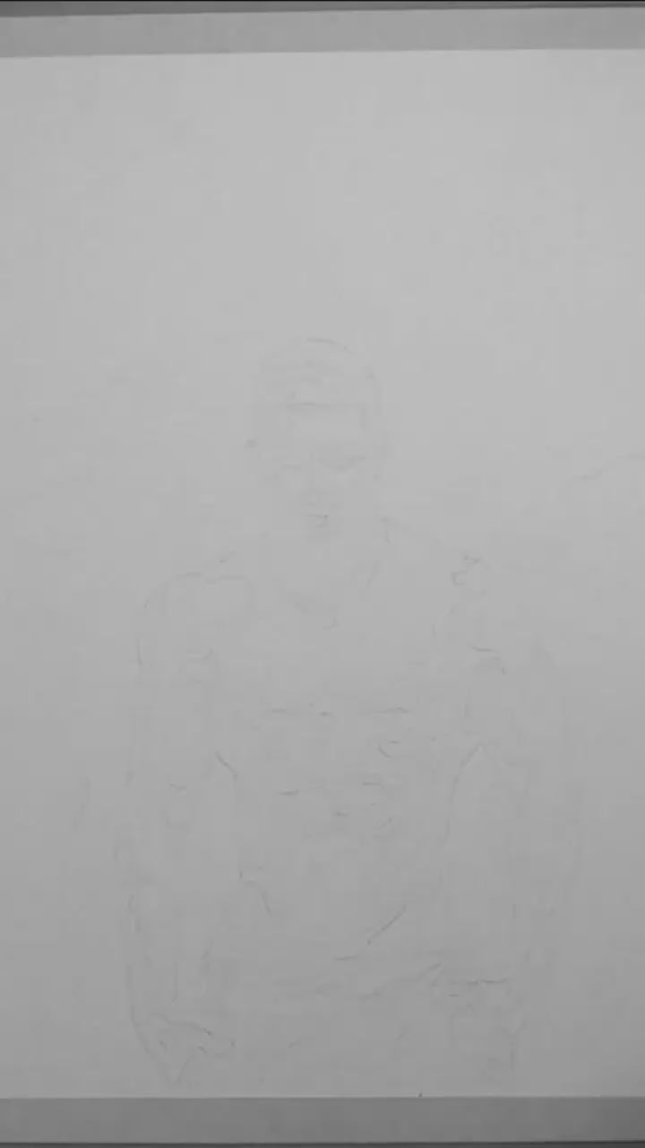 A black and white art video featuring a stylized, muscular male figure against a mountainous landscape.
